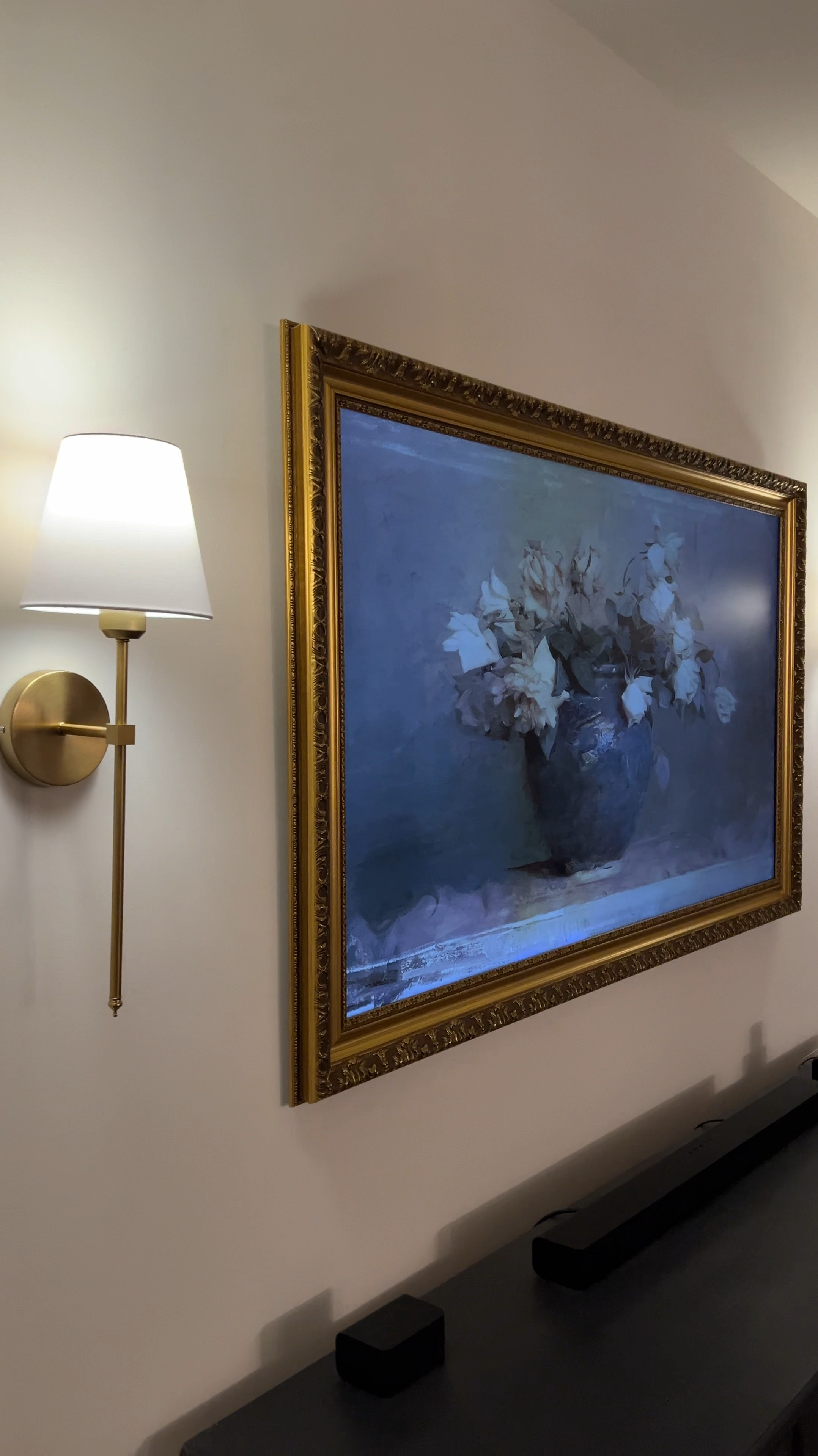 Today’s living room upgrade. Finally got a reasonably priced frame for our Samsung frame Tv after 2.5 years of having it. Also installed these battery operated scones on each side and I LOVE how it ties the room together  

#LTKHome #LTKFindsUnder100 #LTKStyleTip