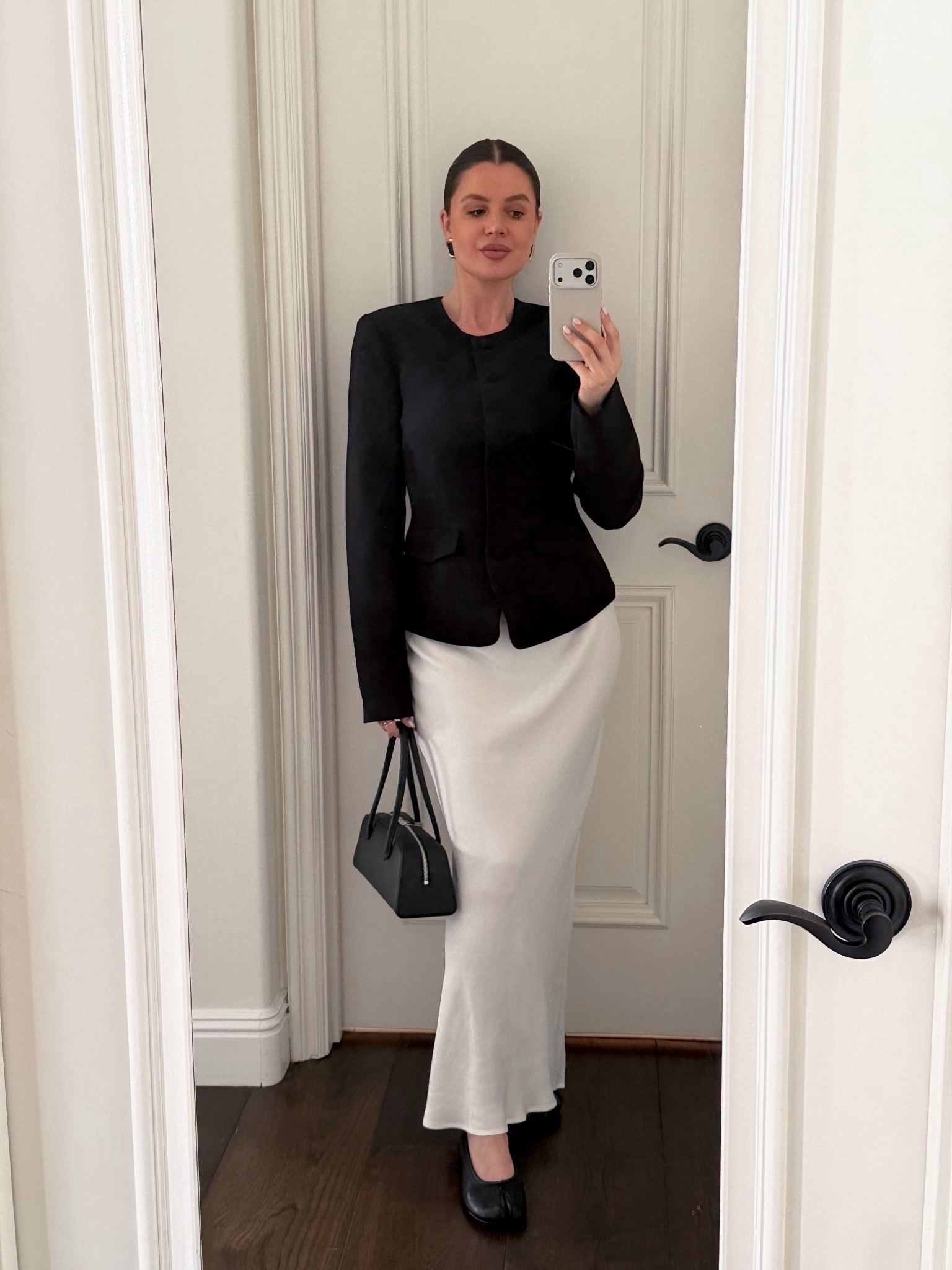 Chic outfit inspo 🖤 Styling this @Revolve   sculpted blazer with a white satin skirt, @Steve Madden US ballet flats and a small top handle bag. Adding gold & black chunky statement earrings to elevate the look 🖤

#chic #chicoutfit #blazer #sculptedblazer #skirt #satinskirt #longskirts #balletflats #springoutfit #workwear #revolve #freja #reformation #stevemadden #splittoe 

#LTKWorkwear #LTKootd #LTKValentine