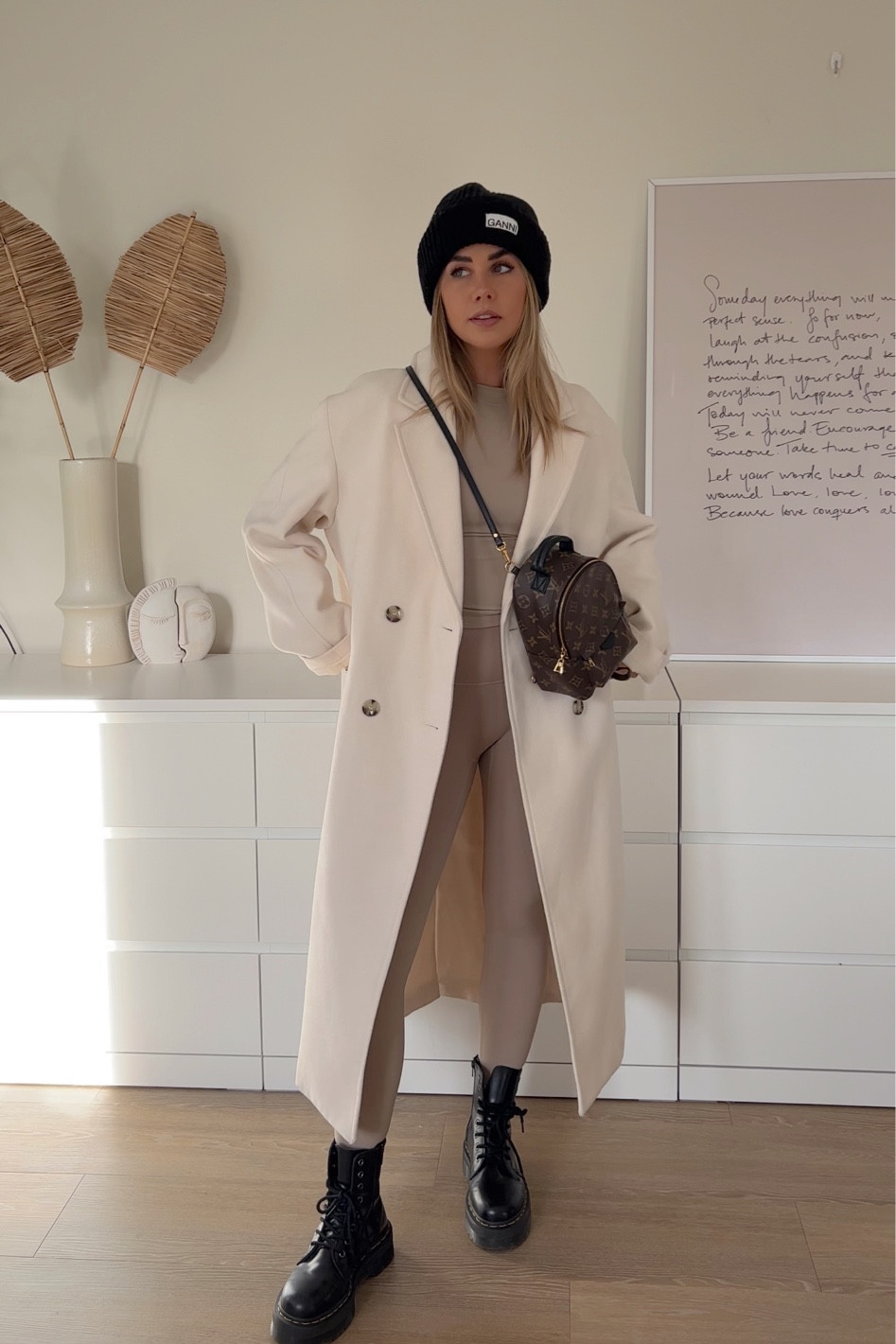 Black ganni beanie - long cream coat - H&M coat - cream outerwear - mink another version second skin set - dr marten Jadon boots - styling activewear for everyday 

#LTKstyletip #LTKeurope #LTKunder50