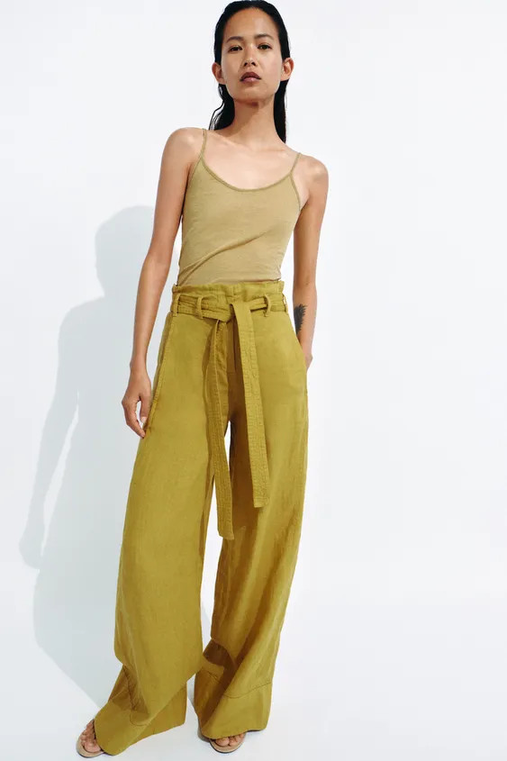 ZARA WOMAN COLLECTIONPants with main fabric made of linen yarn. Mid-rise waist with adjustable be... | Zara US