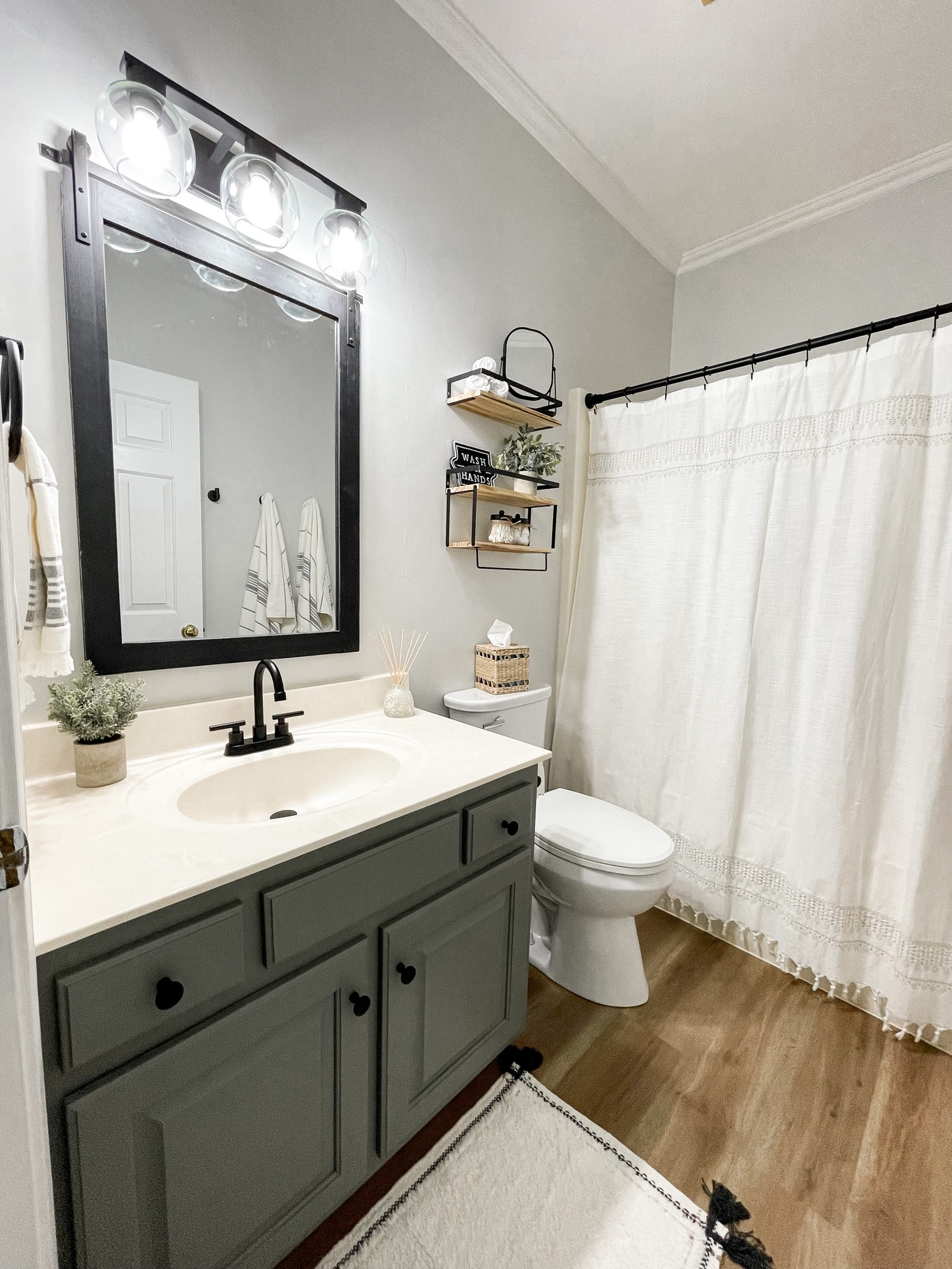 Farmhouse bathroom reno! Target and amazon bathroom decor, bathroom vanity mirror, vanity light 

#LTKhome #LTKFind #LTKunder100
