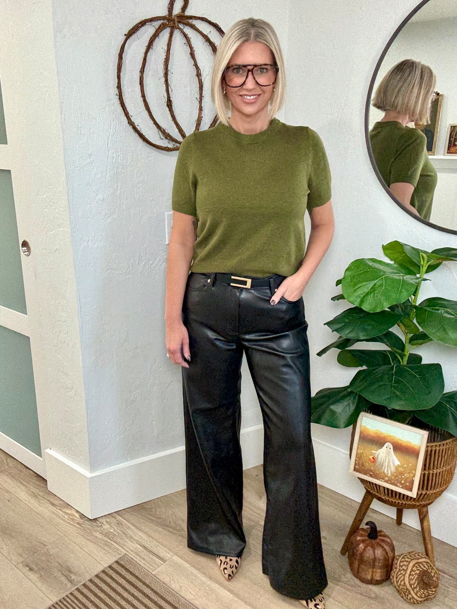 These wide leg faux leather pants are so fun! They add just the right amount of edge to any style. They’re currently in store only. But I’ll link them up as soon as they go live on the site. I’m wearing a 10 and recommend sizing up one. 

This short sleeve sweater is also from Target. I love the color! It’s so good for fall. I’m wearing a medium. 

My boots are from CosyIsland. I’ll link some similar options. 

#LTKOver40 #LTKFindsUnder50 #LTKStyleTip
