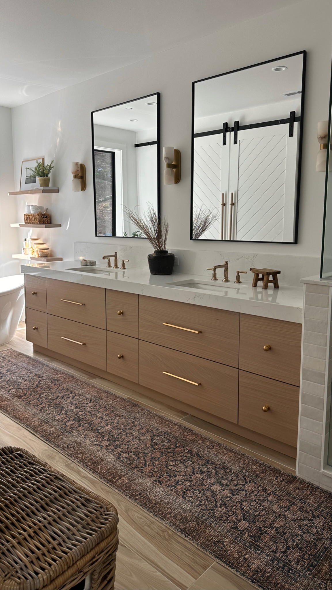 Bathroom design 
48” x 36” black vanity mirror
Rug runner 9’ x 12’
CB2 hardware - brushed brass 
Bathroom faucet - Brizo Invari Luxe Gold 
Bathroom Open shelving 

#LTKstyletip #LTKhome #LTKsalealert