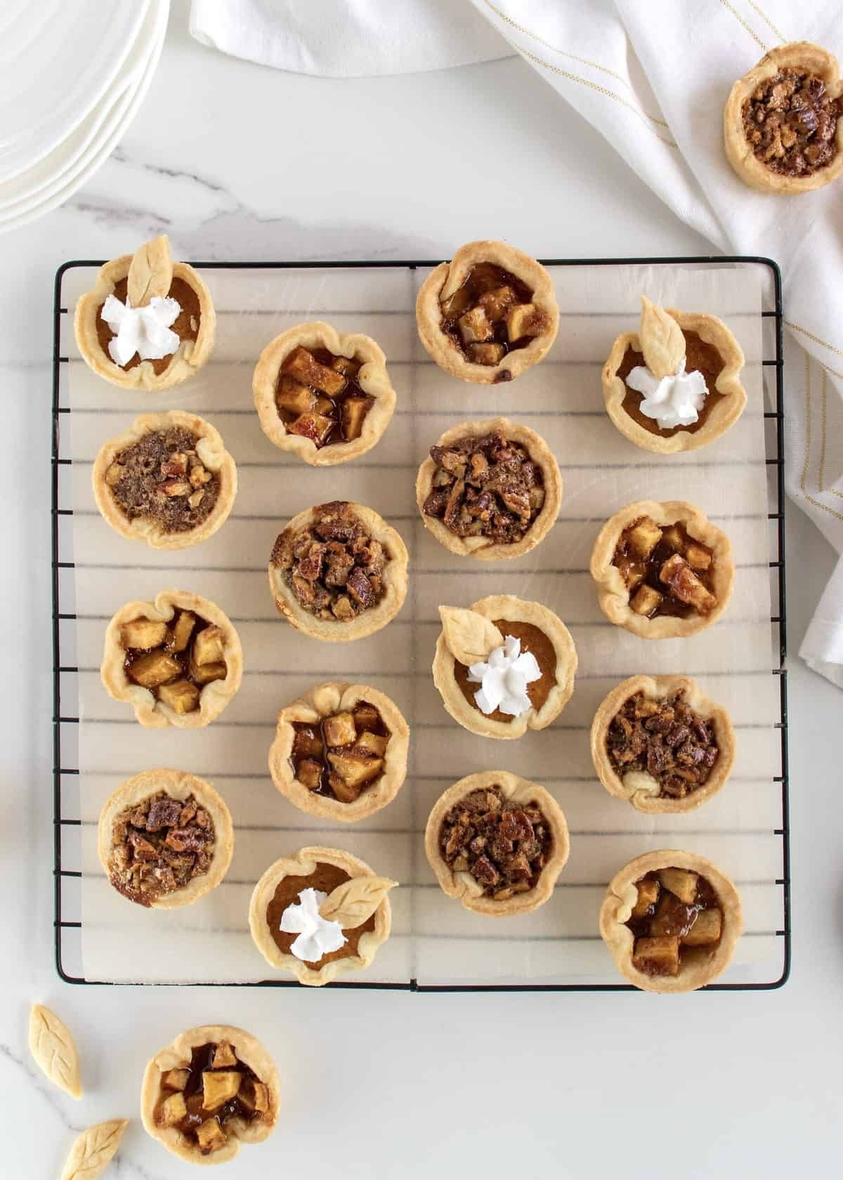 Pumpkin, apple, or pecan? It’s impossible to choose! With One-Pan Mini Thanksgiving Pies Three Ways you don’t have to! Make all three delicious pies at once with this simple, easy-to-follow recipe.

#LTKParties #LTKSeasonal #LTKHoliday