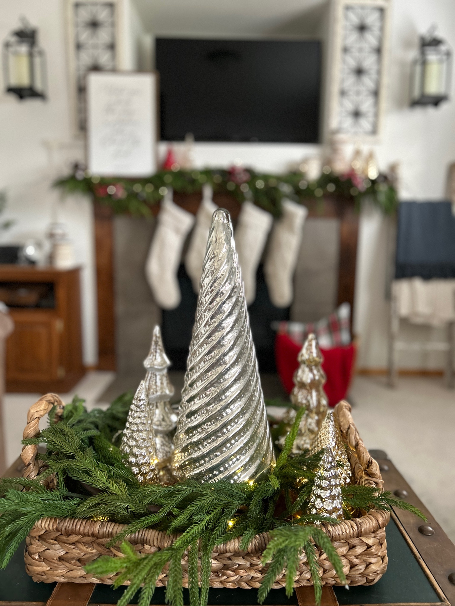 Create a beautiful vignette on a coffee table with mercury glass trees and simple Christmas decor. 

#LTKHoliday #LTKSeasonal #LTKHome