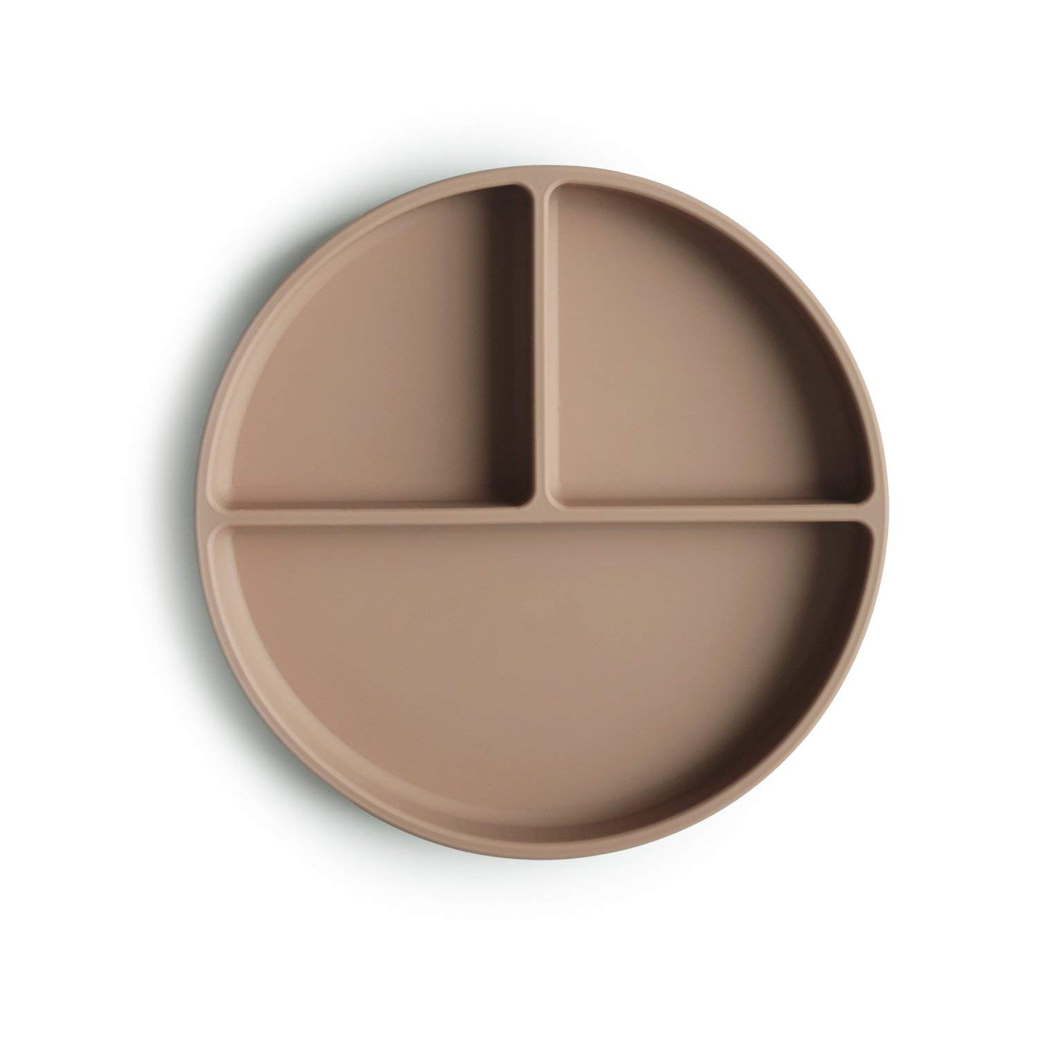 Designed in Sweden, this mushie silicone suction plate features a suction that keeps it in place,... | Amazon (US)