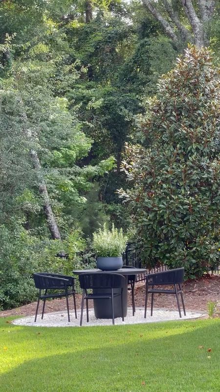 Outdoor furniture and decor, black concrete dining table, black outdoor dining chairs, black and gray outdoor planters, kettle fire pit,  black outdoor adairondak chairs, home decor, outdoor patio, hammock 

#LTKhome #LTKSeasonal #LTKFind
