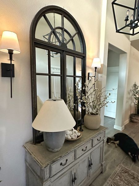 Beautiful lighting options with lantern chandelier, wireless sconces, battery operated candles 

#LTKFindsUnder100 #LTKHome #LTKStyleTip