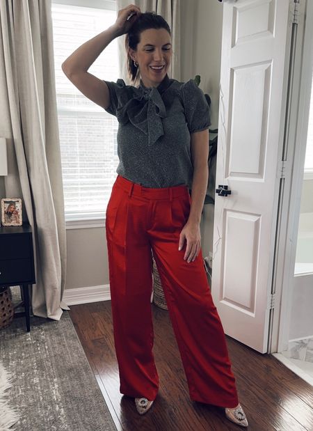 Glittery silver bow top with red wide leg pants that are $32. They also come in black & pink. Wearing a size 6. Holiday outfit idea, holiday outfits, Christmas outfit, red pants, target style 

#LTKfindsunder50 #LTKHoliday #LTKSeasonal