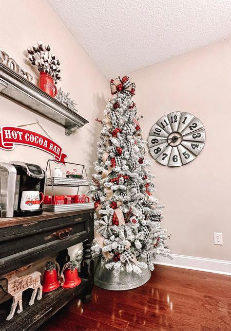 I’ve always wanted a 2nd tree in my dining room next to my hot cocoa bar that i do every year for Christmas & thanks to @kingofchristmas, this year i made it happen! This 7.5” king flock slim tree is the perfect addition! ✨ If you know me, you know I haven’t owned anything but KOC trees for years! have the 7.5” queen flock tree in my living room as well. You can never beat the KOC quality! They’re my favorite trees of all time! Linking both of mine in the LTK app! ❤️ #kingofchristmas 

#LTKSeasonal #LTKHoliday #LTKhome