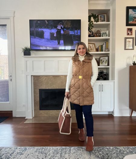 Outfit inspired by The Holiday!
Faux Fur Collar Belted Vest - XS
Turtleneck - Small
Jeans - Petite 4
Shearling Boots - size 7 (I’m usually a 6.5!) 30% off!
Shearling tote - 30% off!

#LTKSeasonal #LTKHoliday #LTKCyberweek