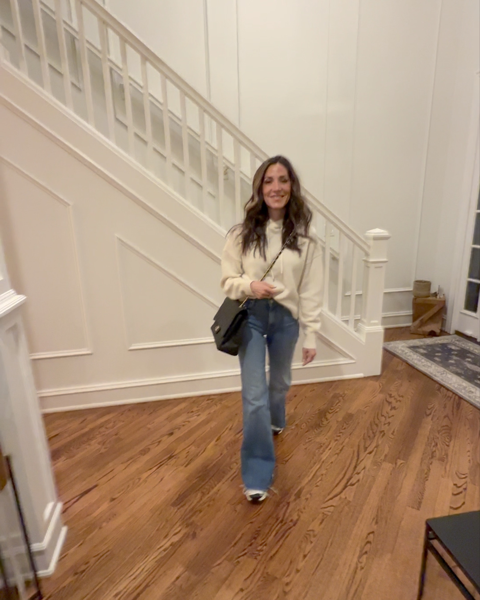 Casual Super Bowl watch party outfit. I have this cashmere hoodie sweater in 3 colors and these jeans are my new favorites. Loving my new sneakers!

#LTKOver40 #LTKootd