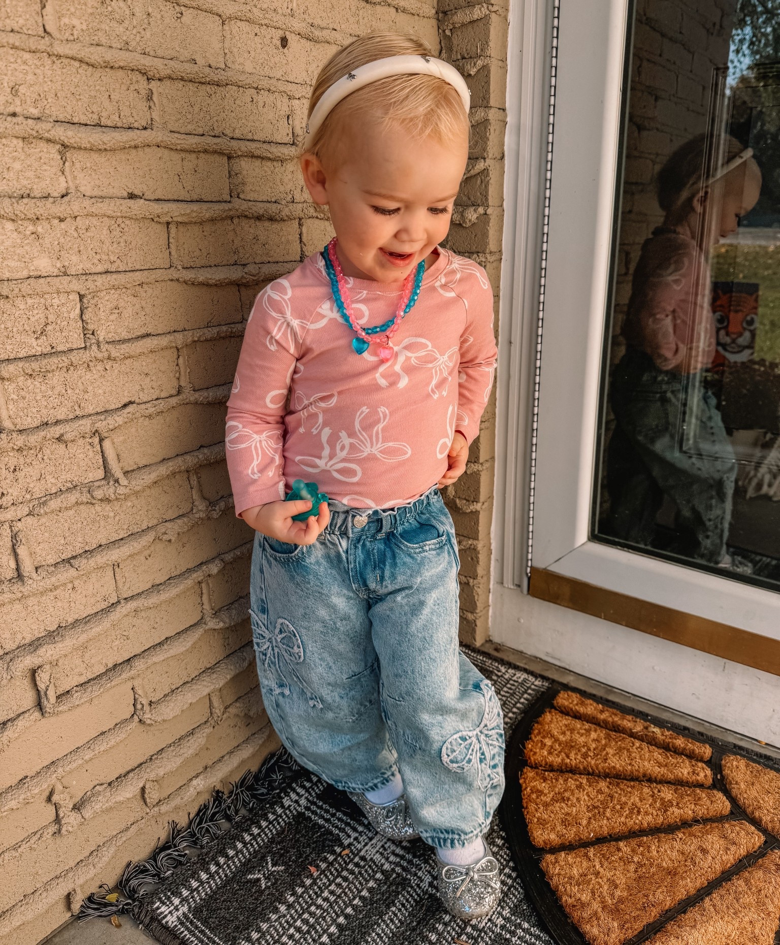 Toddler girl bow shirt 
Horseshoe toddler girl bow jeans
Silver sparkle Mary Janes