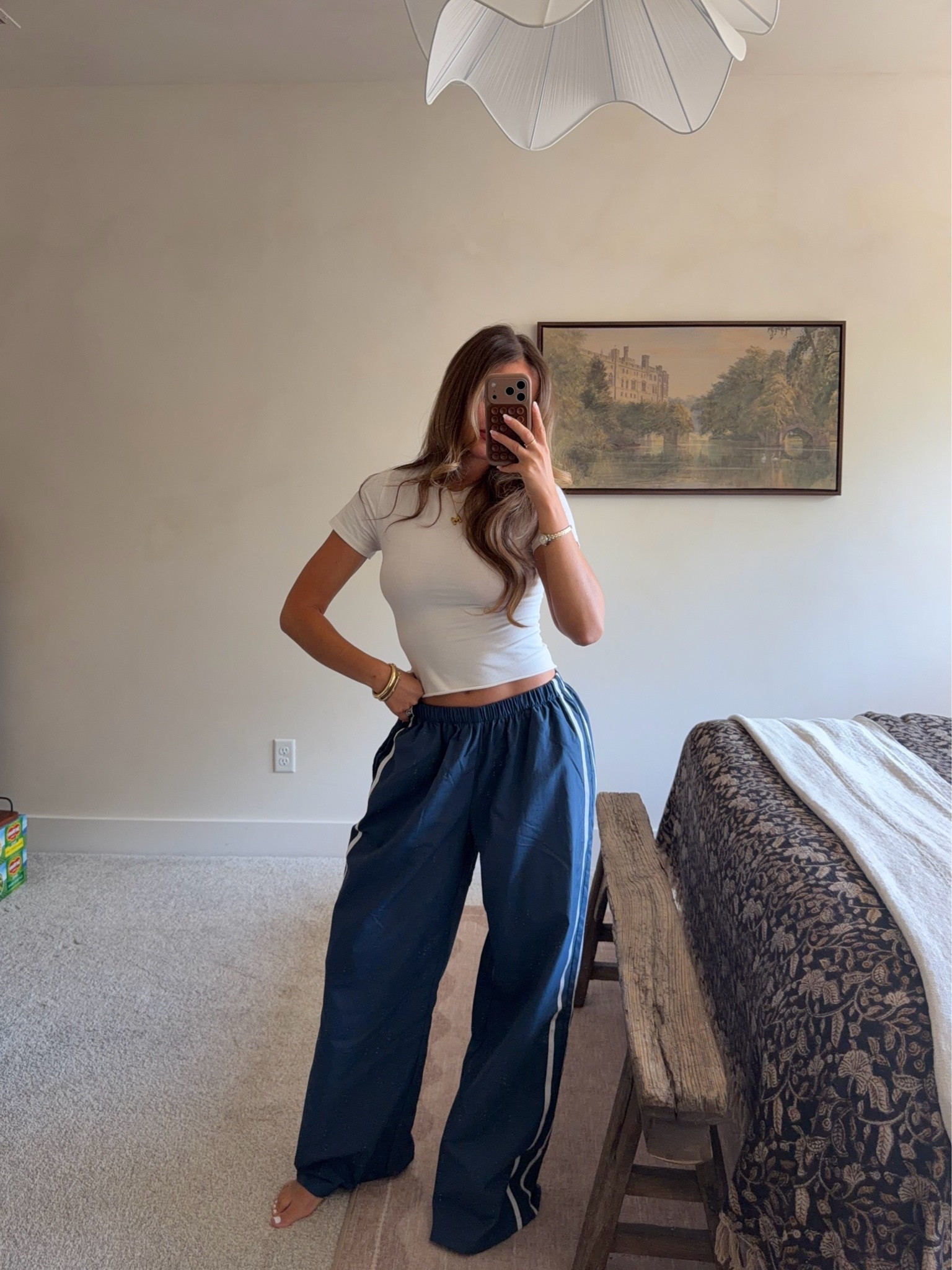Casual outfit idea! The track pants are only $15 & the white tee is on sale for $3! I’m wearing size S in the top & sized up to a M in the pants for an oversized fit!

#LTKootd #LTKSaleAlert #LTKgrwm