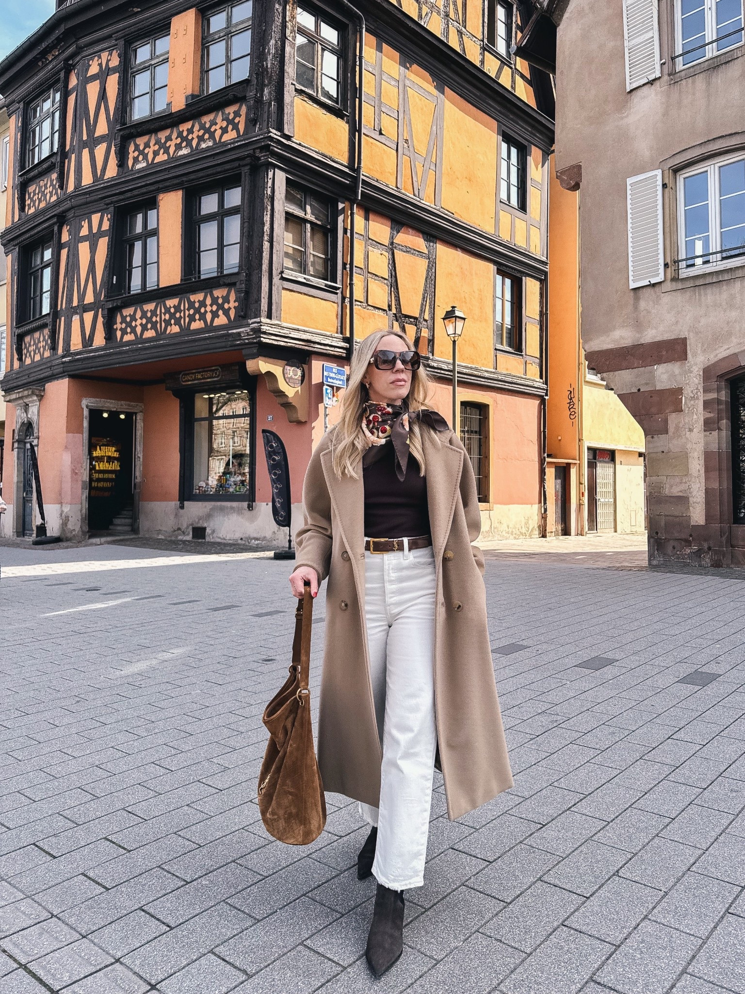 Spring outfit, European vacation look, camel coat, silk scarf, @Levi's white ankle jeans, dark brown suede boots, YSL suede bucket bag

#LTKSeasonal #LTKOver40 #LTKTravel