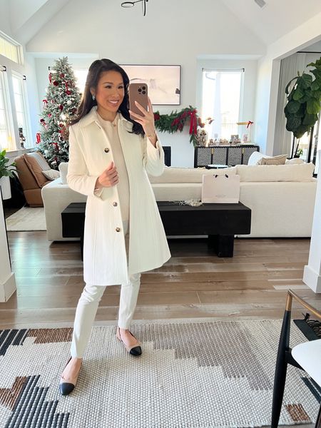 Smart casual workwear with cashmere ribbed sweater that is on sale for 20% off in select colors and one of my favorite winter coats that is on sale for 30% off! I love the silhouette and fit of the coat. Fits TTS! Paired it with work style leggings and flats for a chic look 

#LTKsalealert #LTKSeasonal #LTKstyletip
