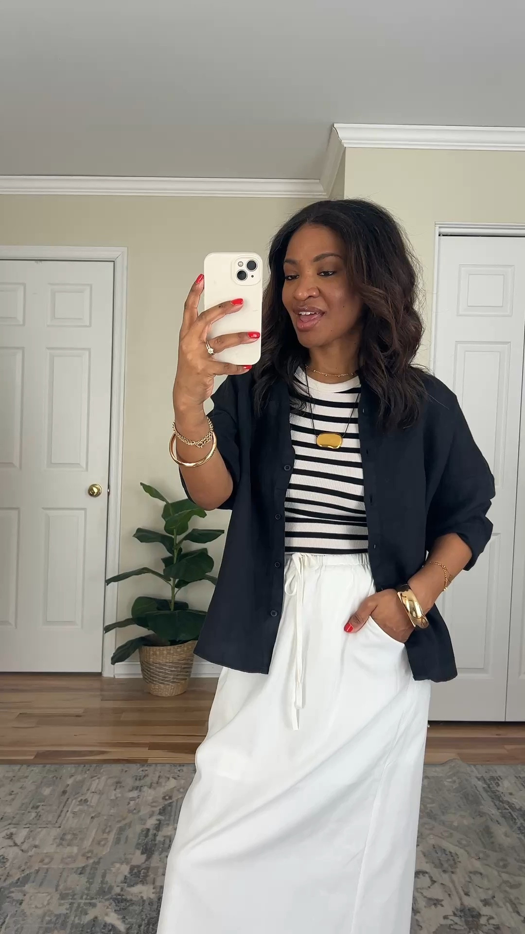 Wearing a medium and the black button down. Wearing a small and the striped tank top. Wearing a small and the skirt. The skirt runs kind of big so I probably could’ve sized down to an extra small. True to size in the sandals.

 #ltkootd #ltkover40 #ltkgrwm