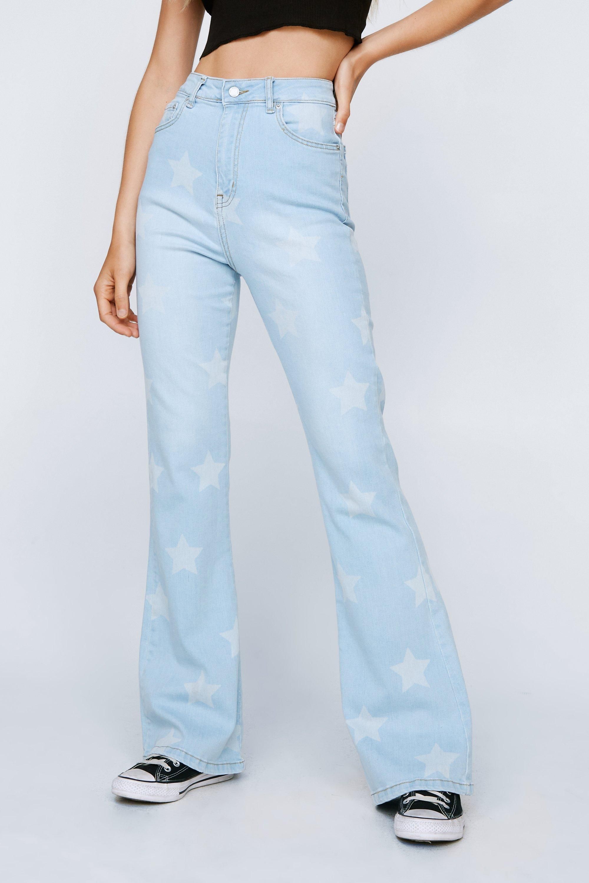 Star Print High Waisted Stretch Denim Flared Jeans | Nasty Gal (US)