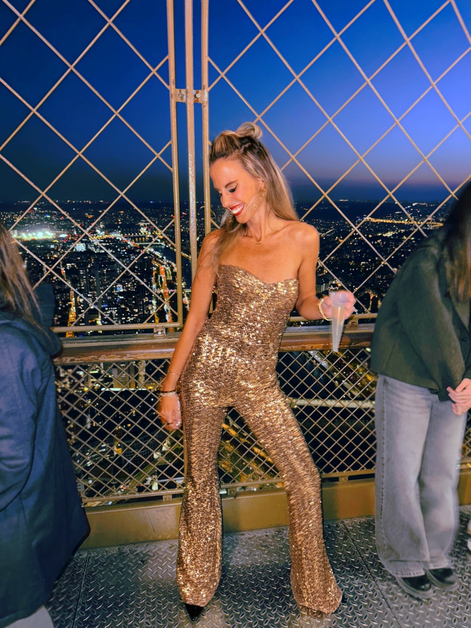 A moment for the sparkly jumpsuit ✨✨✨—just trying to keep up with the Eiffel Tower, because when she sparkles, the whole city shines. One of my favorite designers for a standout fit—every piece feels custom-made and every piece has its unique design of stand out sparkles! Linked this one and a few other of my favorites from Nadime! 

#LTKWatchNow #LTKStyleTip #LTKTravel