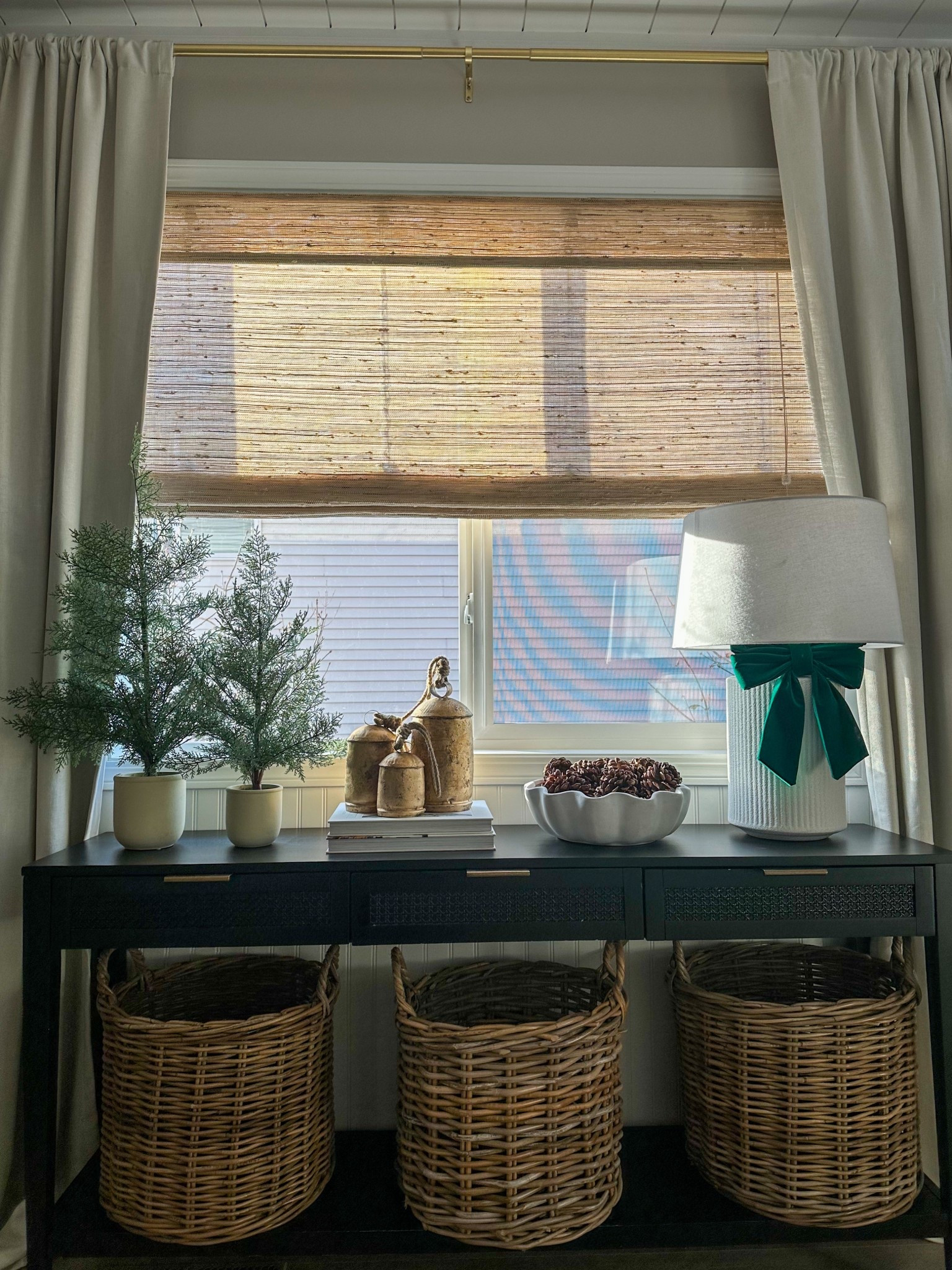 Christmas entryway decor!

Christmas console table styling, faux pine ones, large velvet bow, brass bells, rattan baskets, black console table, faux Christmas trees, pottery barn dupe curtains, rustic jute blinds 

#LTKHoliday #LTKHome #LTKSeasonal