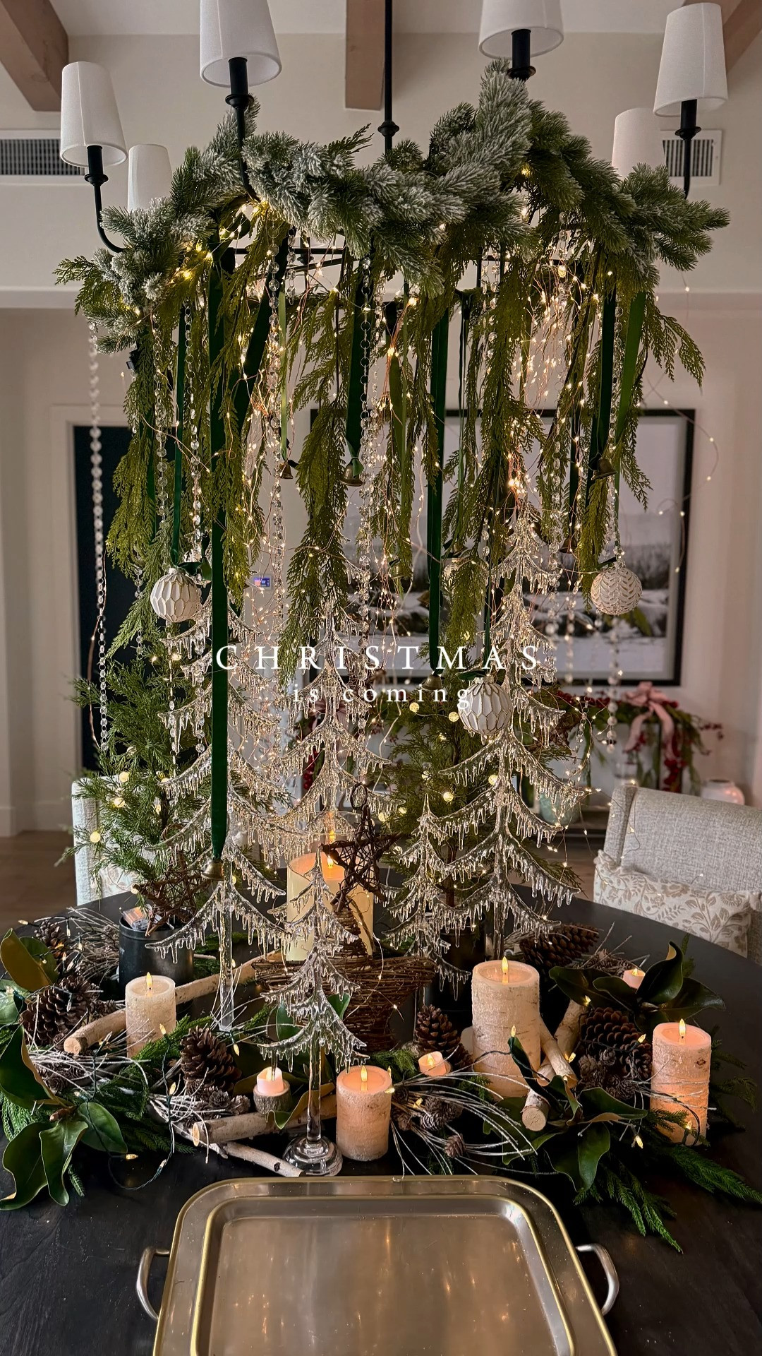 ✨ Christmas is right around the corner, and I’m all about creating that wow moment in your home! 🎄✨ I styled this look with sparkly crystal evergreen trees as the centerpiece, layered in some faux garland around the chandelier, and finished it off with velvet ribbon, ornaments, and a few jingling bells for that cozy holiday magic. 💫

It’s giving faux winter wonderland vibes — the perfect setup to impress your holiday guests and make every dinner feel extra special. ❄️❤️ 

 

#LTKHoliday #LTKSeasonal #LTKHome