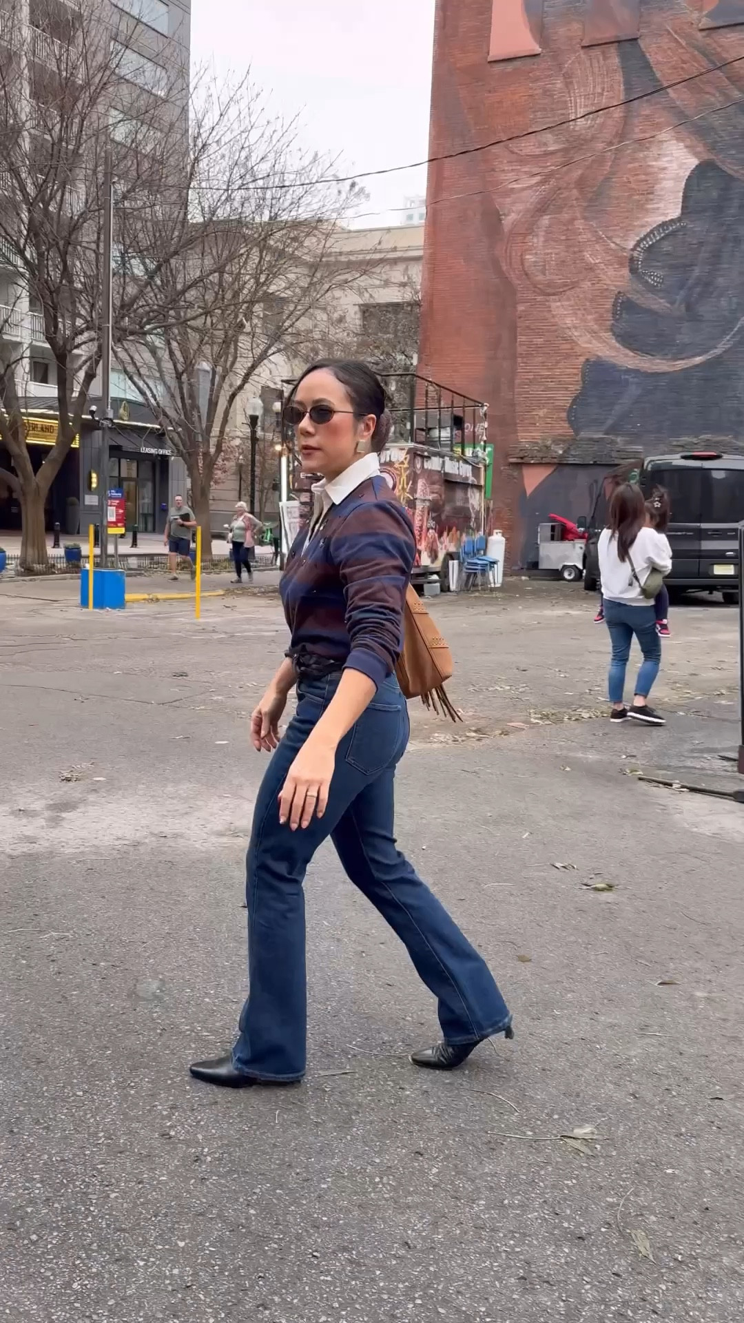 26 petite in the Favorite Daughter jeans. TTS. Perfect with a kitten heel, but could wear with sneakers. I’m 5’2. Small in polo shirt. TTS. It’s a thick cotton, nice structure. Brown chouchou from Kmellia in my hair  

#LTKmomlife #LTKootd #LTKPetite