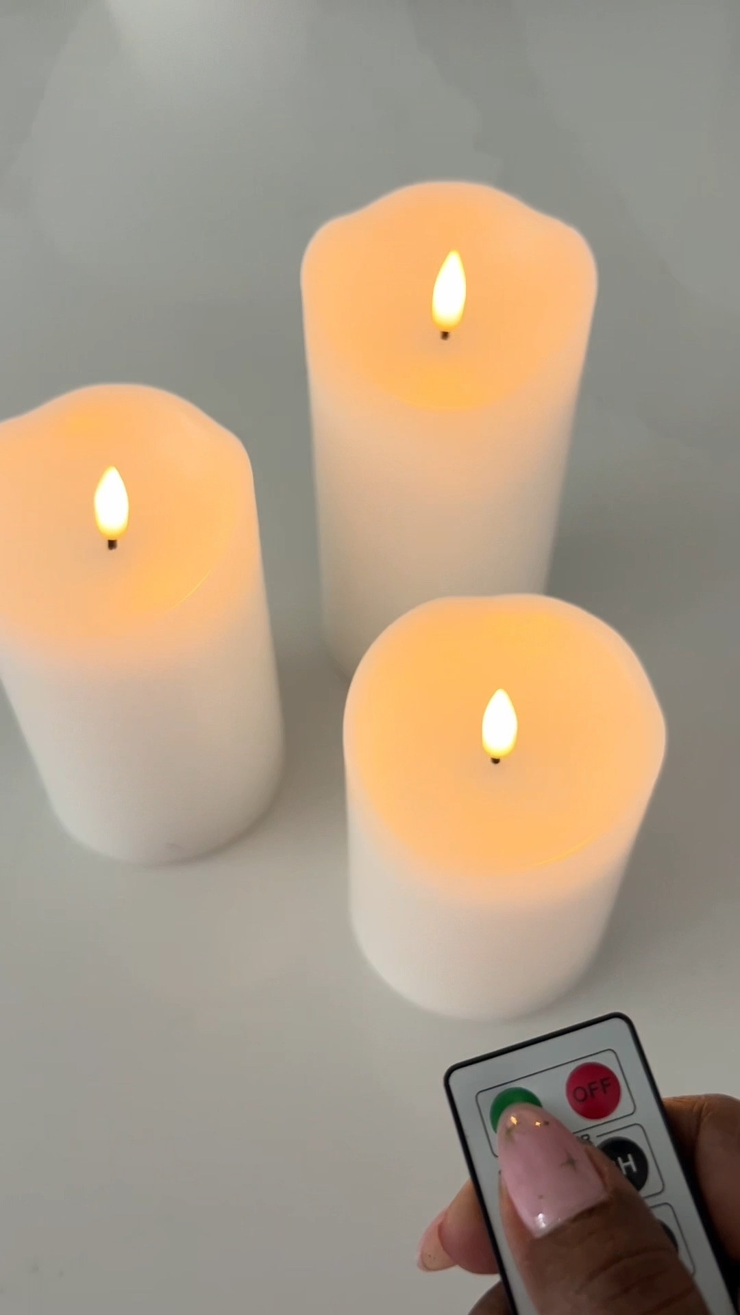 Little details like this make evenings feel calmer.

Setting up LED flameless candles and styling them inside a clear vase.

I linked the candle set I use  if you’re curious.

#LTKHome #LTKHoliday