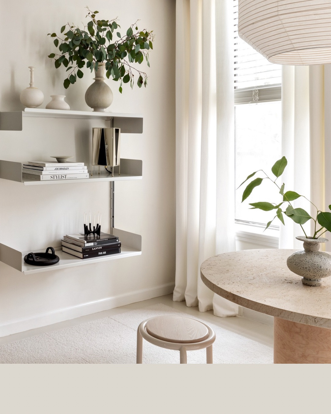 you can't have too many lamps. i love using them within shelving units like i have here on my vitsoe shelving.

the metal plates swivel and you can turn the black ones all the way around so it's all ivory.

#LTKHome