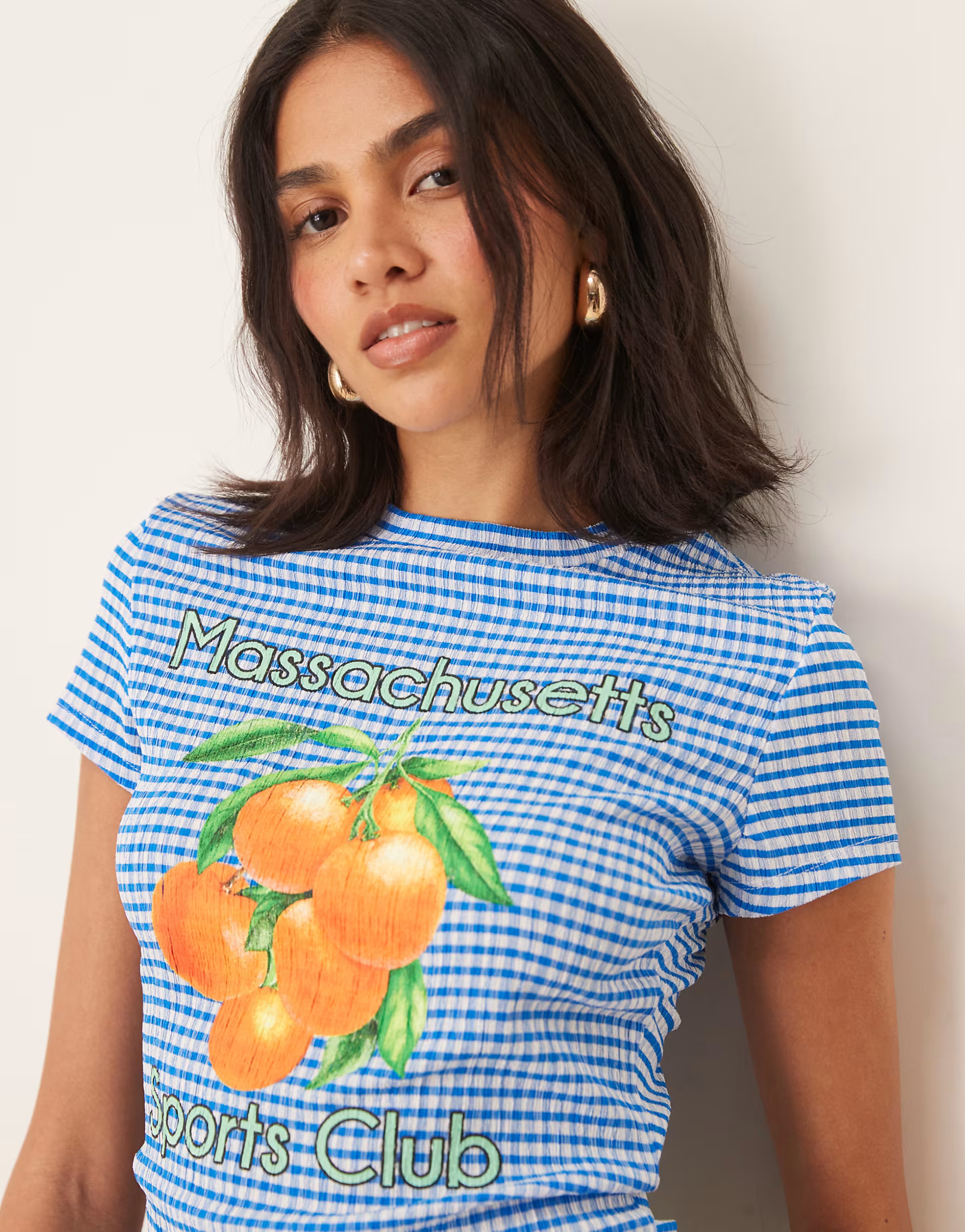 ASOS DESIGN blue gingham baby tee with orange graphic | ASOS | ASOS (Global)