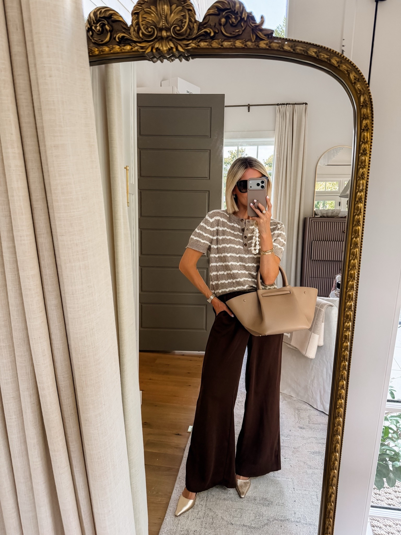 Give me all the brown tones for fall! This short sleeve sweater is so cute and pairs perfectly with these chocolate brown pull on pants! It’s such easy everyday look for the season! Wearing a S in the top and a XS in the pants! Loverly Grey, Target, new arrivals, fall outfit, brown pants, short sleeve sweater

#LTKSeasonal