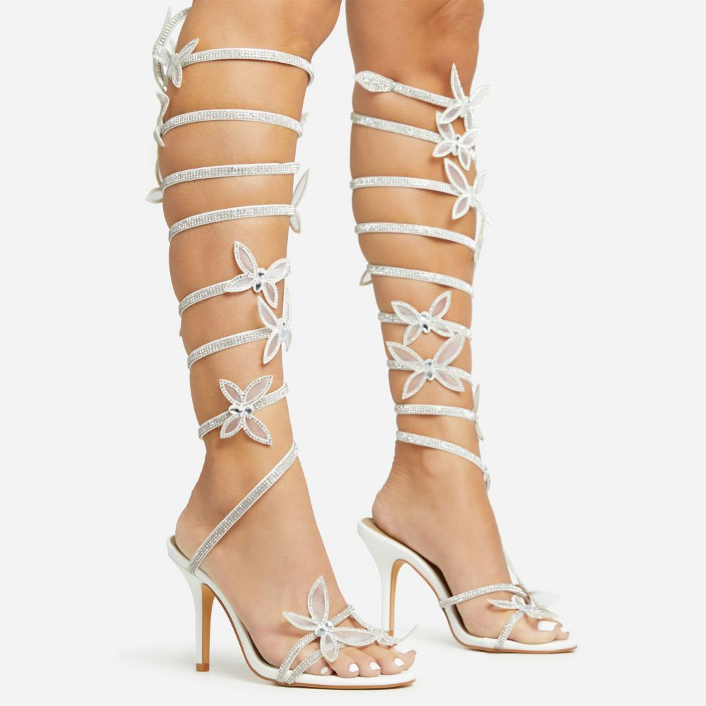 Dramatic-Fantasy Diamante Butterfly Detail Knee High Wrap Around Strap Stiletto Heel In White Fau... | EGO Shoes (US & Canada)