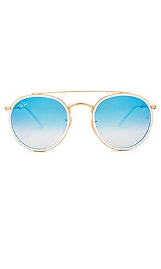 Ray-Ban Round Double Bridge in Gold & Blue Gradient Flash from Revolve.com | Revolve Clothing (Global)