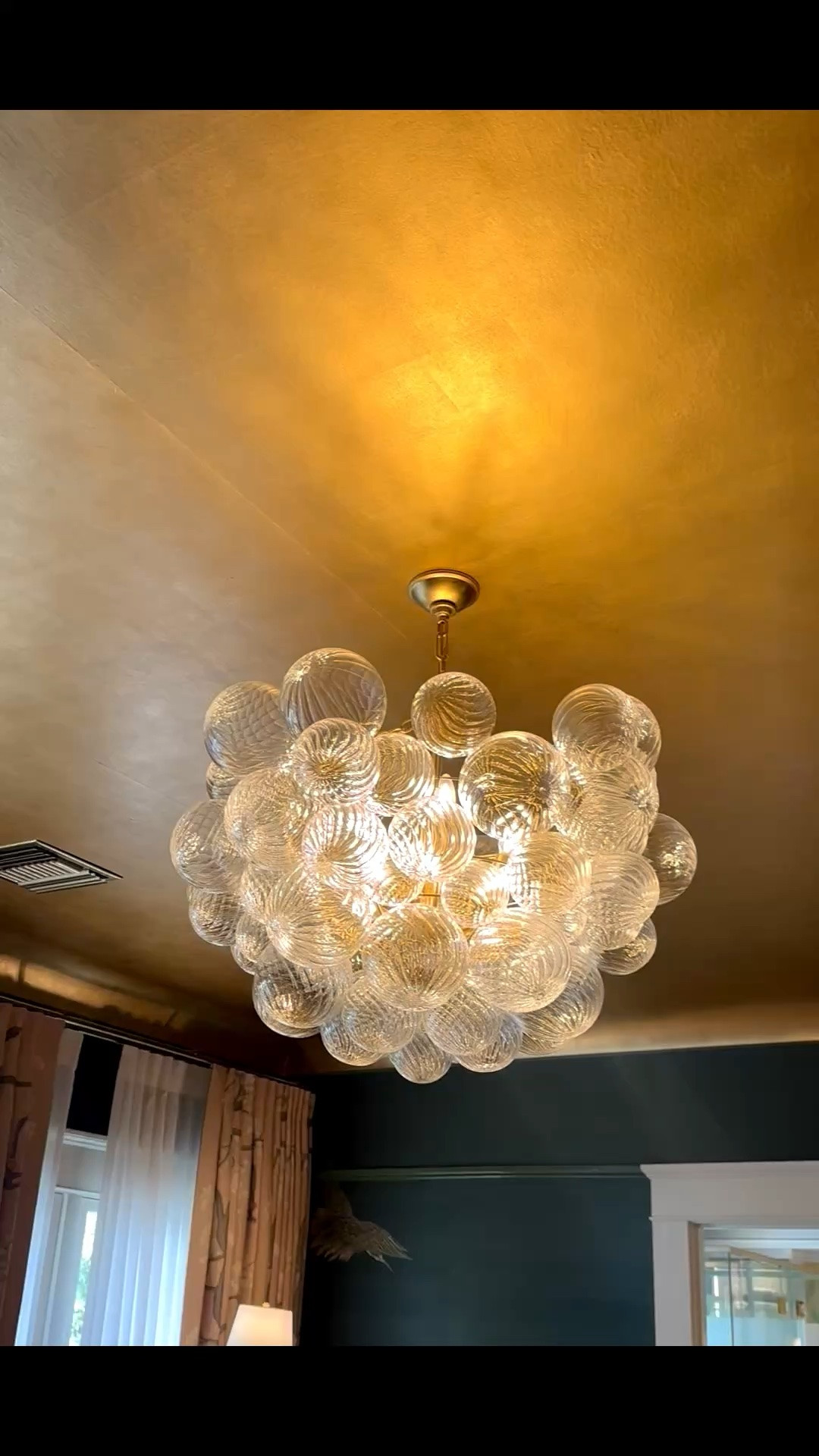 Statement chandelier moment — I love the way each glass bubble catches the light, creating a soft reflective glow that feels airy, sculptural, and effortlessly elegant. A perfect piece when you want the room to feel elevated without looking heavy.

#statementchandelier #chandeliermoment #lightingdesign #sculpturallighting #interiordesign #diningroomlighting #entrywaylighting #modernlighting #homedecor #designerlighting

#LTKHome