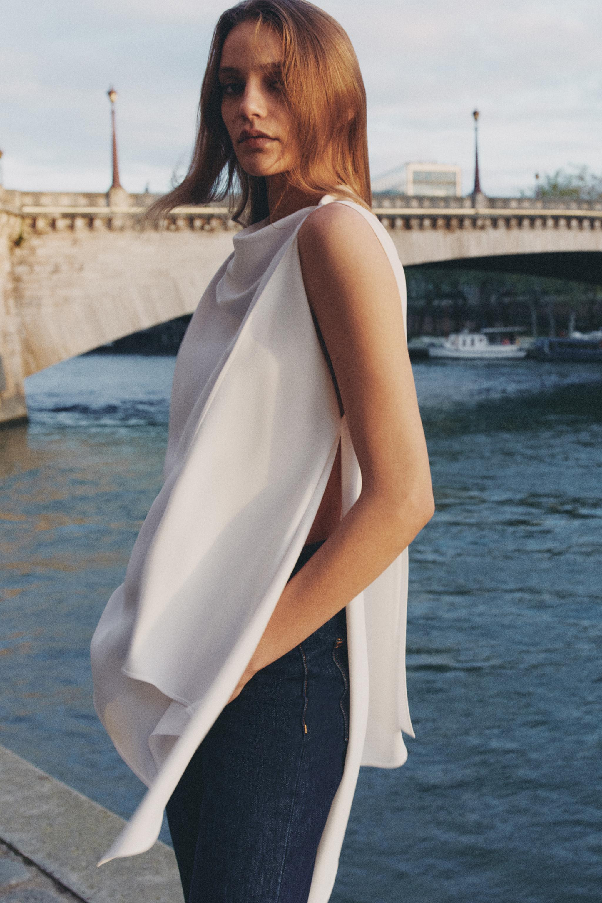 ZARA woman COLLECTIONFließendes Oberteil mit Cape-Ärmeln und asymmetrischem Saum. | Zara DE