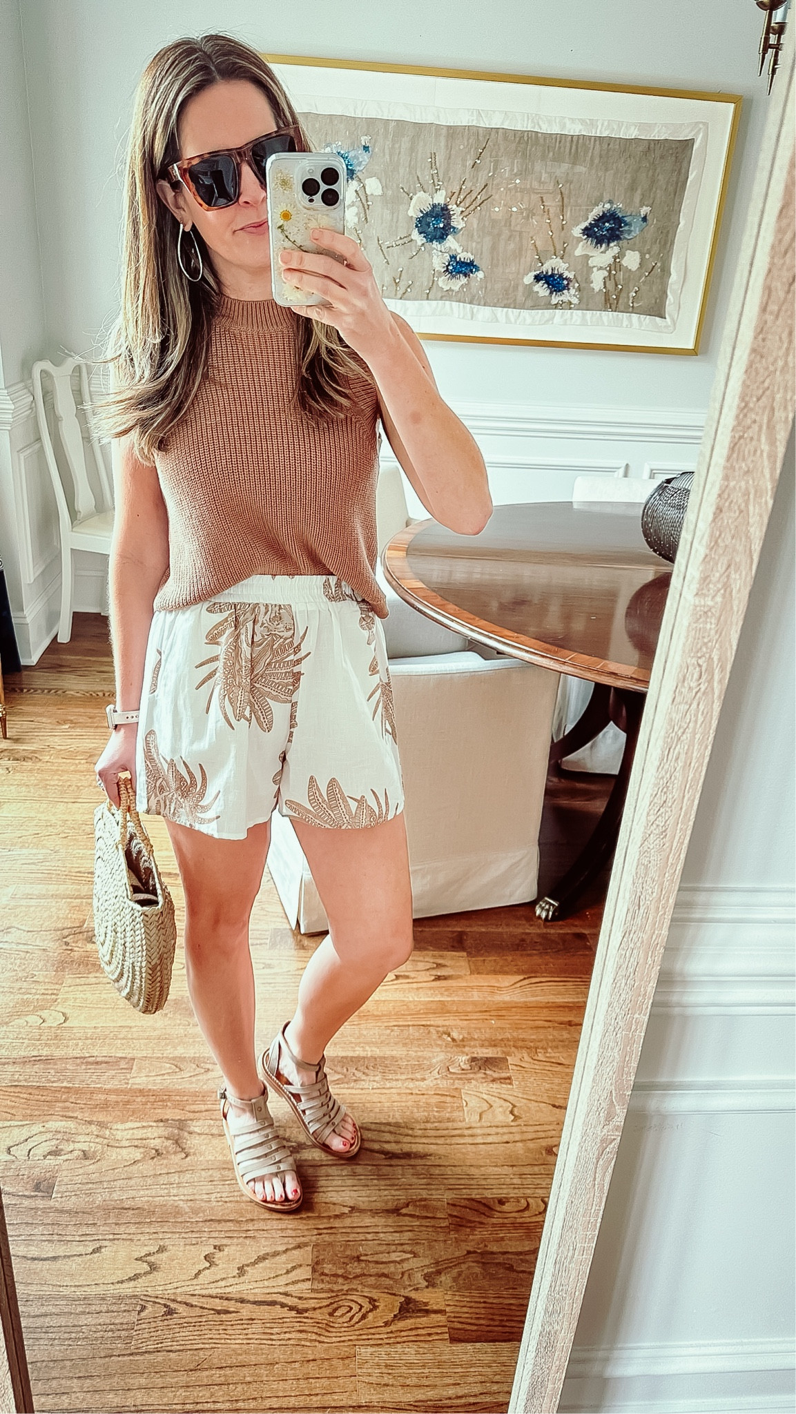 This look is everything. It is the perfect spring and summer look. It is perfect for beach vacations or really any day of the week.

Travel outfit | resort wear | beach outfit | linen shorts | rattan handbag | sunglasses | Europe 

#LTKstyletip #LTKtravel #LTKeurope