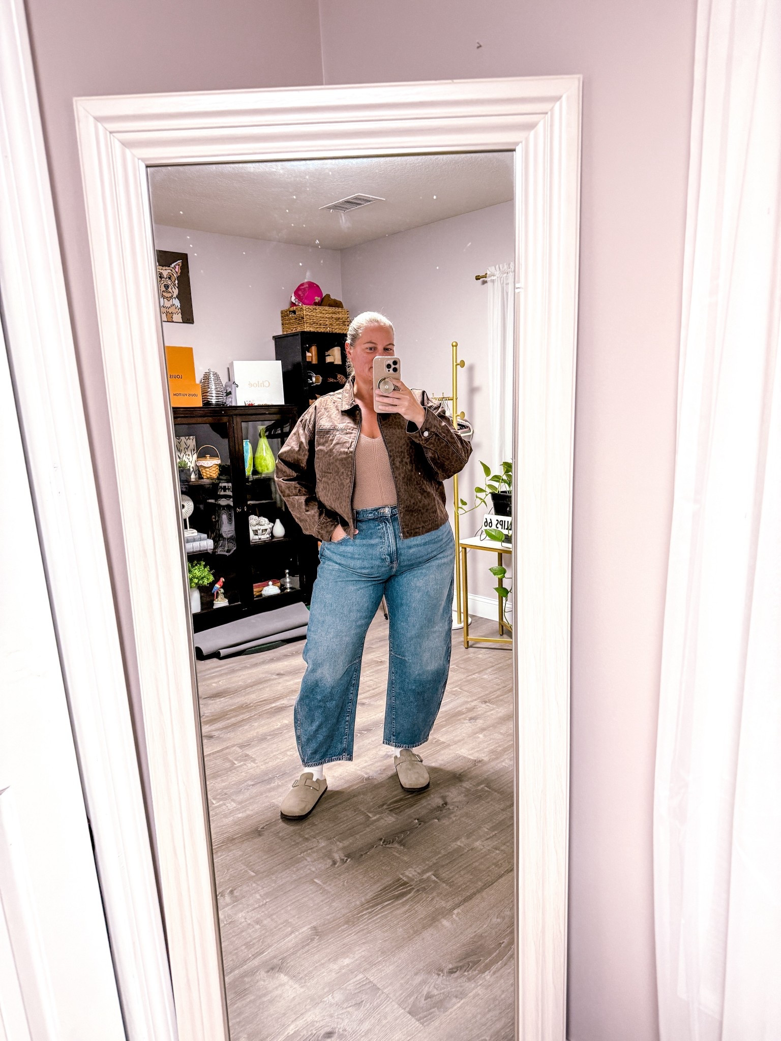 Someone said next week has cooler weather and I AM ready in this adorable fall outfit. Finally gave in and got these cute barrel jeans. The perfect wash for fall. I also snagged this leopard print denim jacket. It is the perfect length and such great quality! And you cannot go wrong with clogs for fall / these are from last year but they are still available! 

Jeans and jacket fit TTS. 
I sized up 1/2 size in clogs to wear with socks. 

#LTKSaleAlert #LTKSeasonal #LTKOver40