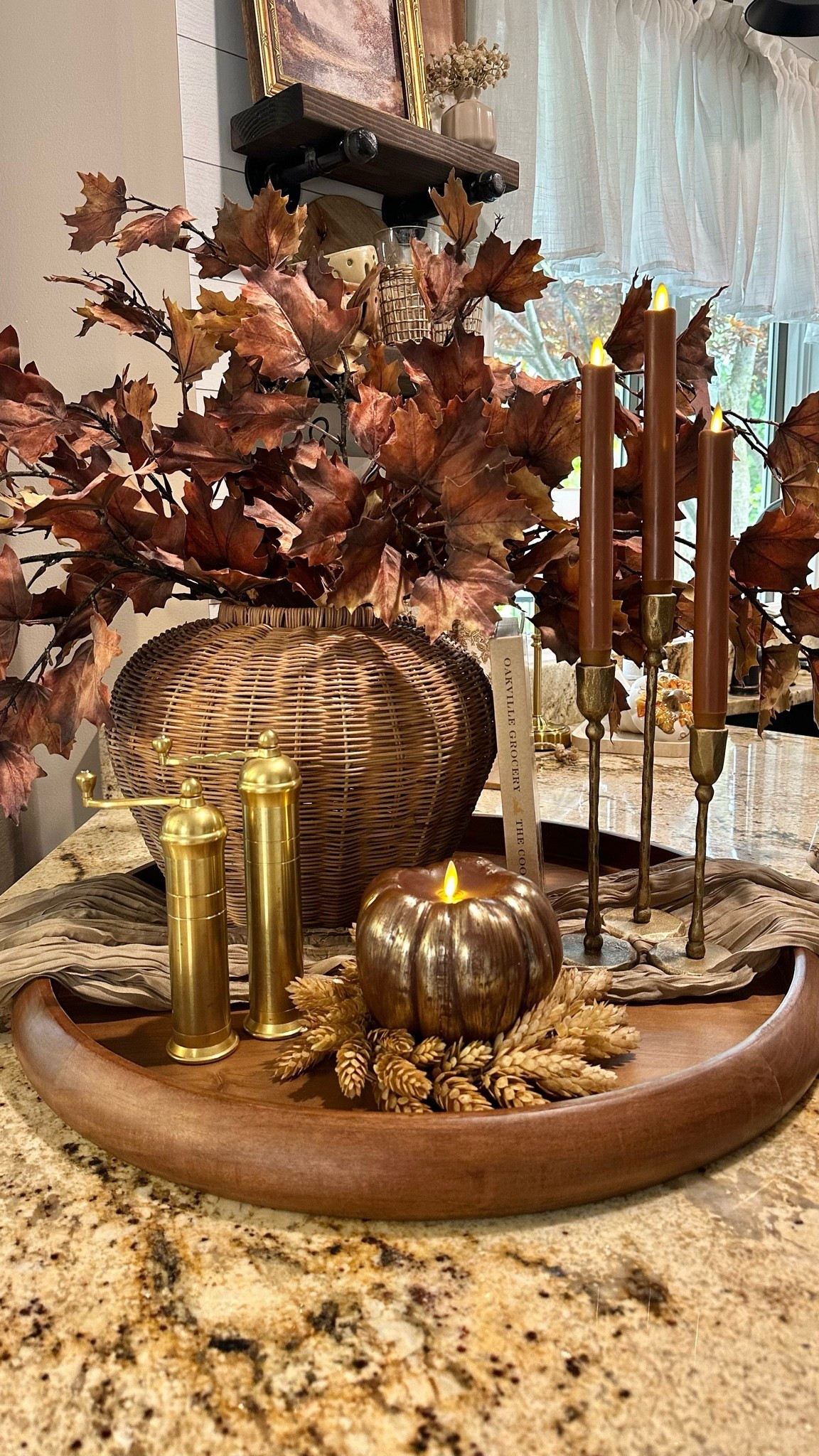 Cozy Fall Centerpiece 🍂✨ 

There’s something about the warm glow of candlelight that makes those first touches of fall feel even cozier. I layered rich autumn branches, warm wood tones, vintage-inspired brass, and a mix of Luminara candles to bring this fall moment together. 🍂

#LuminaraCandles #FlamelessCandles #TaperCandles #PumpkinCandle #BrassCandlesticks #BrassDecor #FallBranches #FauxFallBranches #MapleBranches #WickerVase #WovenVase #WoodTray #FallCenterpiece #KitchenIslandDecor #FallKitchenDecor #FallTableDecor #AutumnBranches #FallFloralArrangement #FallHomeDecor

#LTKHome #LTKSaleAlert #LTKSeasonal