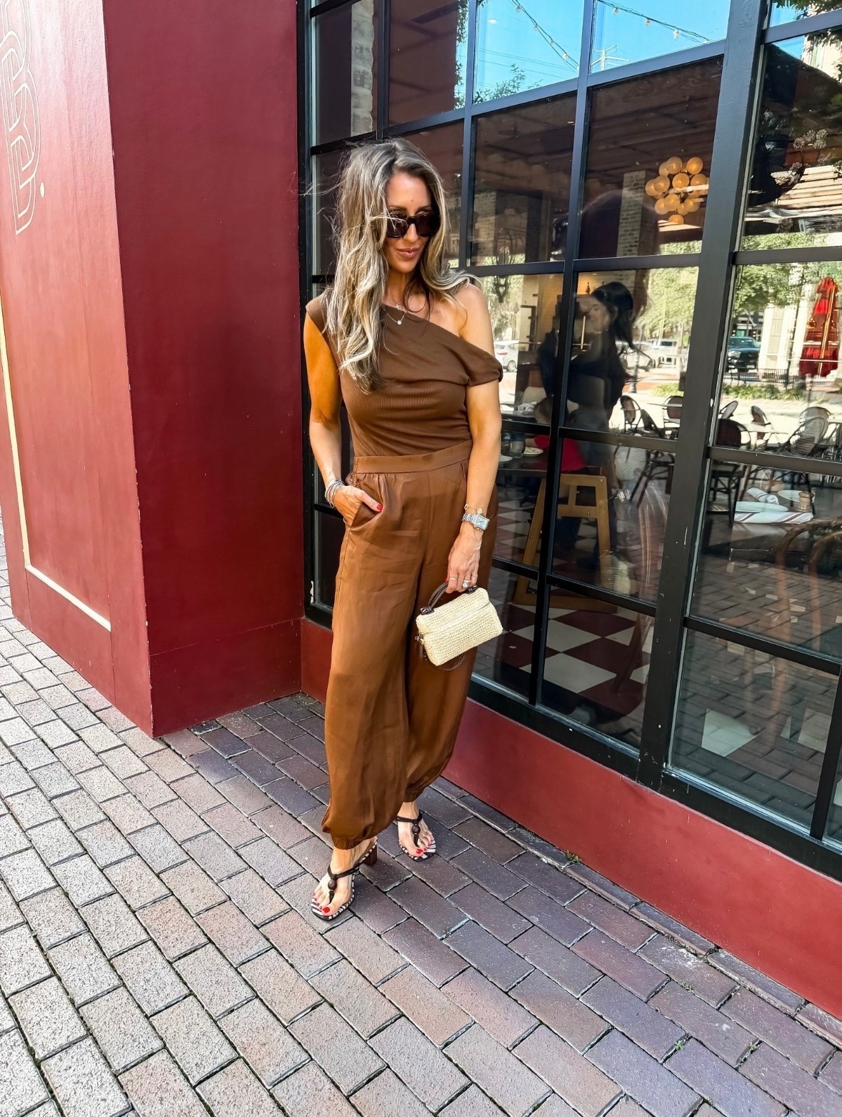 TRENDING! This rich chocolate brown set is one of those outfits that looks elevated with almost no effort. The one shoulder top adds a fun twist, while the relaxed pants keep it comfortable enough for dinner, date night, or vacation evenings. Paired with woven accessories and simple sandals, it’s an easy summer look you’ll reach for again and again.

Wearing M top and bottom, runs a little big 

brown matching set, one shoulder top, vacation outfit, date night outfit, summer style, resort wear, woven handbag, neutral outfit, elevated casual, wide leg pants, chic summer outfit, dinner outfit, travel style, effortless fashion, themominstyle

#LTKootd #LTKOver40 #LTKSeasonal