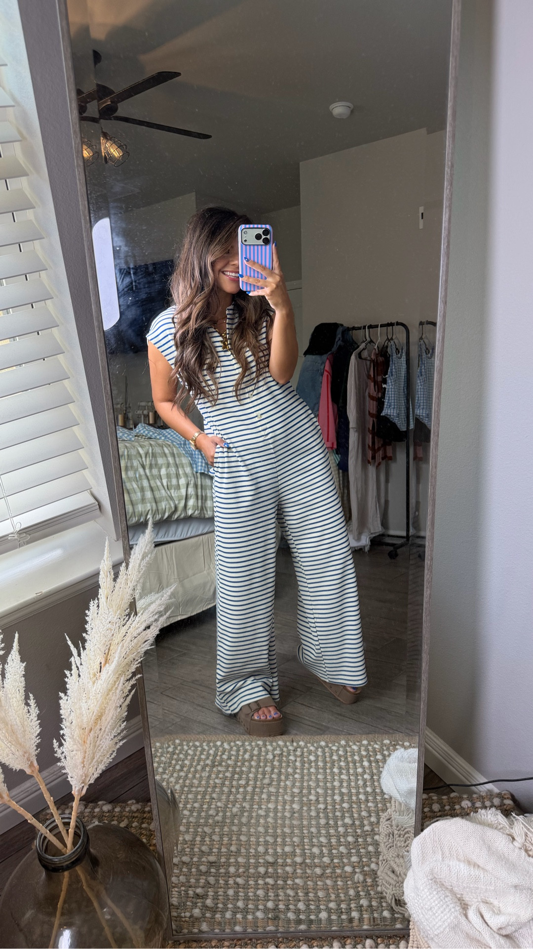 striped jumpsuit summer   wide leg jumpsuit casual   sleeveless button down romper   summer casual outfit   spring glow up jumpsuit   effortless one piece outfit   striped wide leg pantsuit   beach vacation jumpsuit   resort wear 2026   comfy summer romper   LTK summer style   LTK seasonal outfit   LTK under 50   easy throw on look   flowy striped jumpsuit   casual day to night outfit   summer fashion jumpsuit   wide leg romper women   button front jumpsuit   vacation outfit inspo

#LTKootd