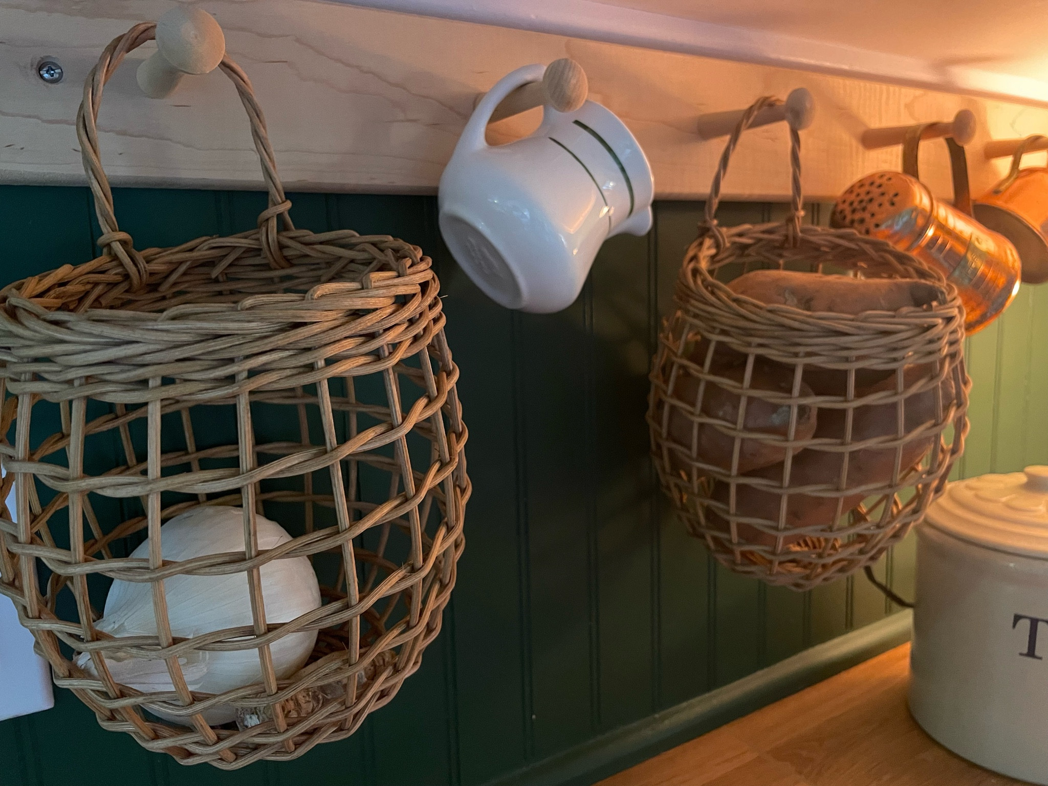 These hanging produce baskets are the best that I’ve found and I’ve been looking forever!! The handles are perfectly twisted and secure enough to potatoes, onions, bananas, etc…
So helpful to clear up clutter and free up much needed counter space!

#LTKHome #LTKFindsUnder50