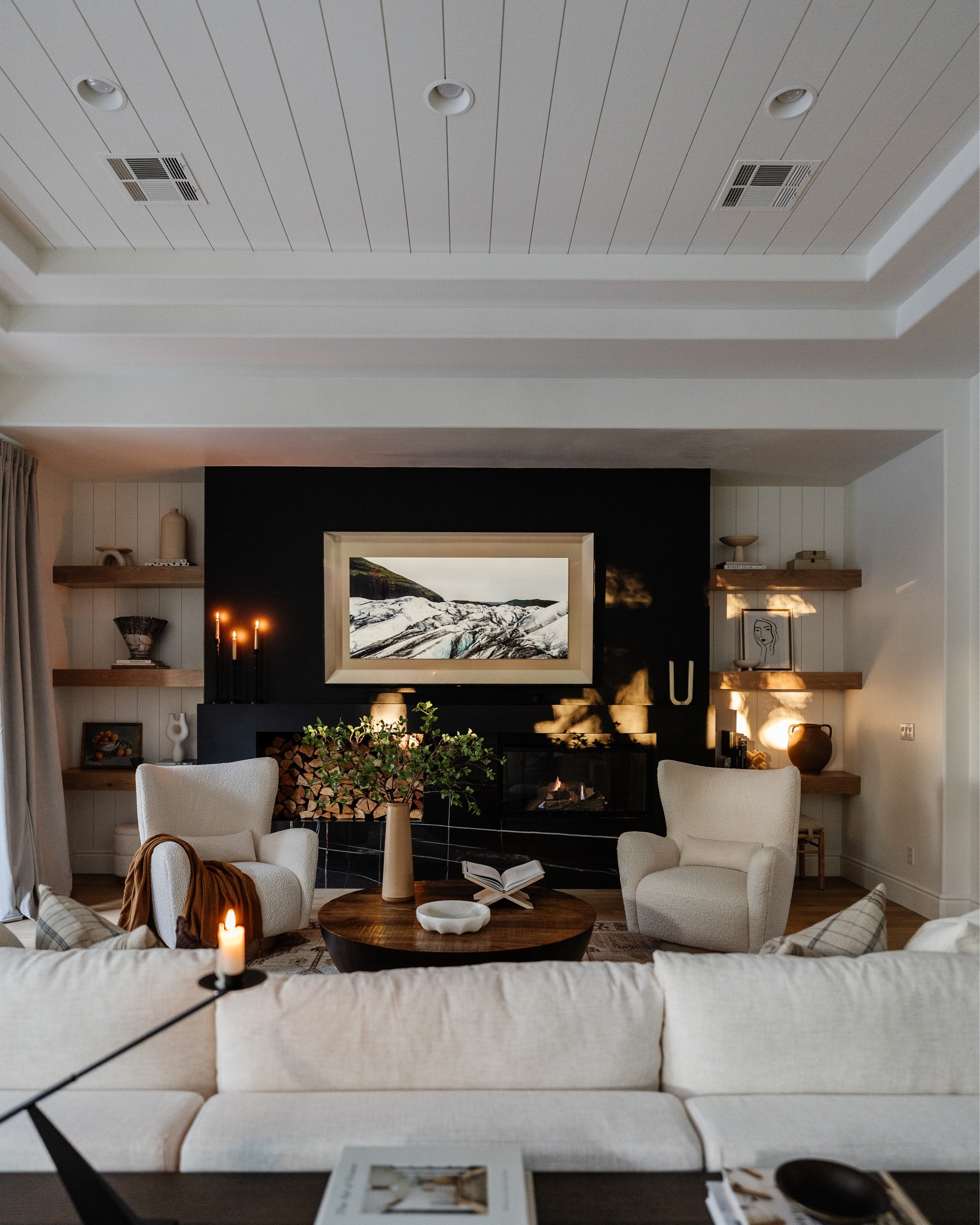 Living room

Swivel chairs, round coffee table, faux stems 

#LTKhome #LTKfamily #LTKstyletip