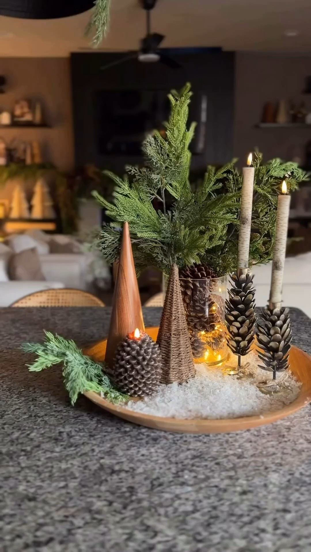 Beautiful and simple modern organic vibe centerpiece, pine greenery, fake
Snow, birch candles , table
Top trees 

#LTKHoliday #LTKHome #LTKSeasonal