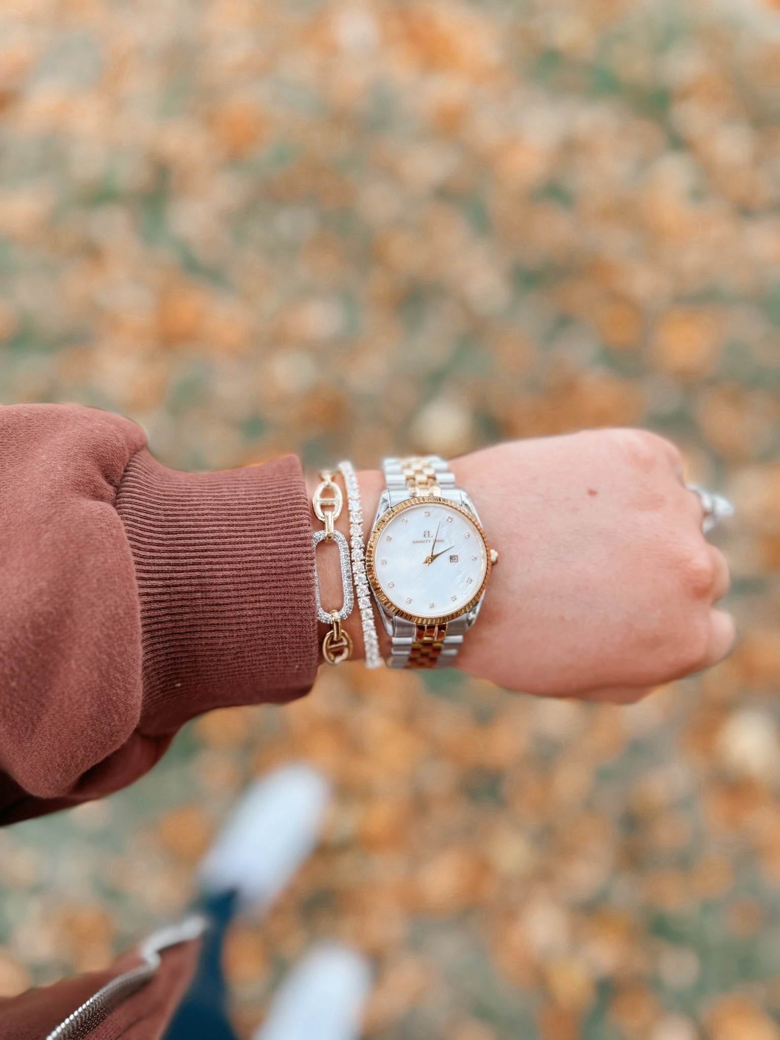 Cozy layers, elevated details 🍂🤎 Looking down at my favorite fall outfit with a bracelet stack that makes even the comfiest look feel polished ✨ fall outfit inspo | cozy chic style | layered bracelet stack | elevated jewelry look | autumn accessories | gold bracelet layering | watch and bracelet combo | casual fall outfit | influencer jewelry style | everyday jewelry favorites | LTK fall fashion | cozy autumn vibes | fall style essentials | minimalist jewelry stack | holiday gift ideas | jewelry gift guide | bracelet stack gifts | gifts for her | luxury inspired jewelry | gold jewelry gifts | festive jewelry ideas | holiday shopping favorites | influencer gift picks | LTK holiday finds | gift guide must haves | layering bracelet gifts | elegant jewelry gifts | cozy holiday style

#LTKSaleAlert #LTKStyleTip #LTKFindsUnder50