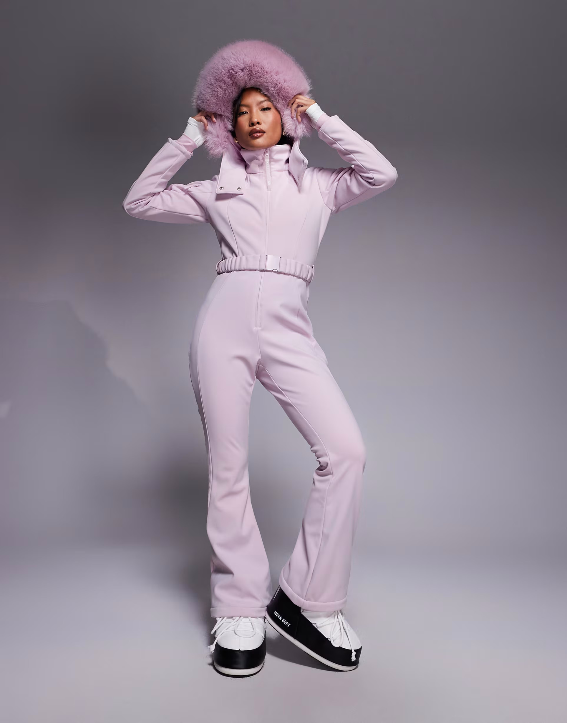 ASOS 4505 Petite Ski soft shell belted ski suit with slim kick leg and faux fur hood in pink | ASOS (Global)