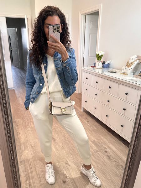 Comfy travel outfit! Size M in Jean jacket. Size S in joggers. Shies are super comfortable! Bag comes in a bigger size.

#LTKstyletip #LTKU #LTKtravel