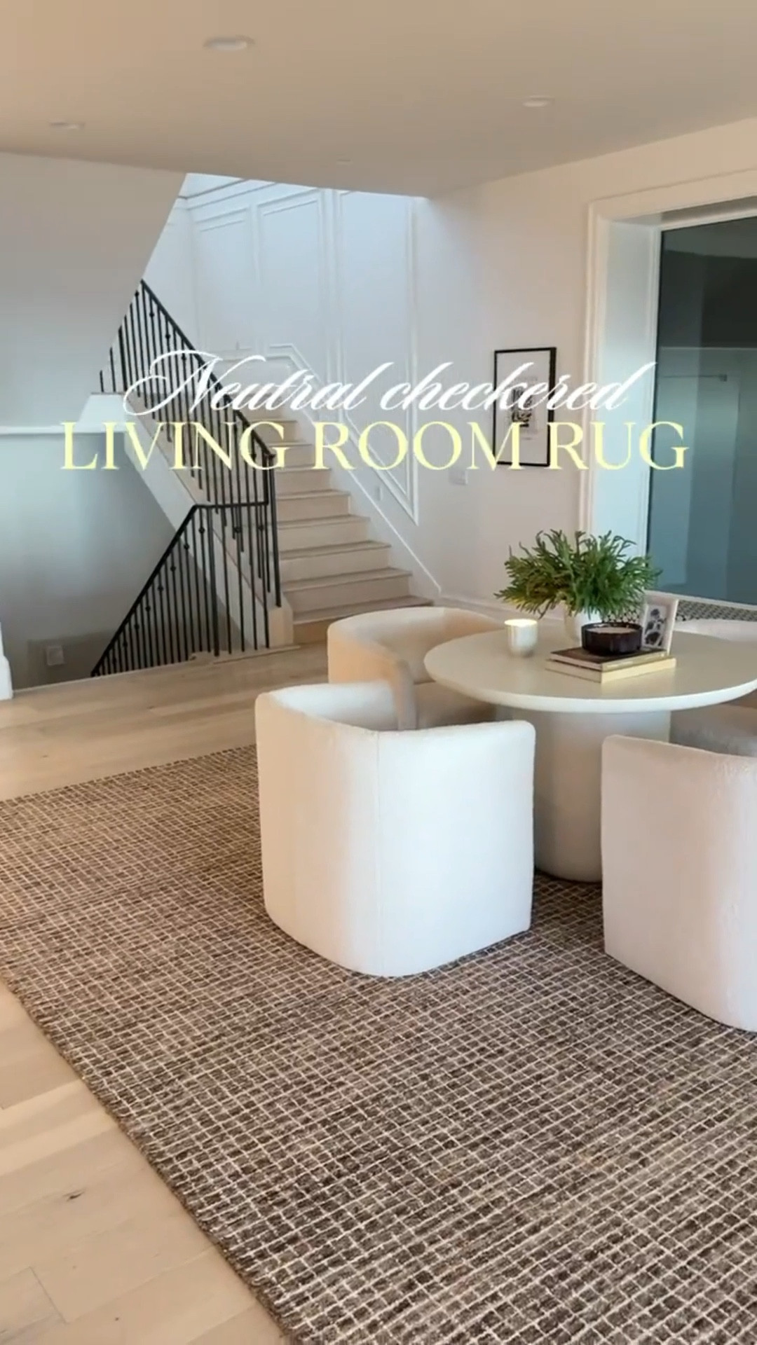 Neutral checkered living room rug from @amazon @amazonhome 

White table from @cb2
White chairs from @target @targethome

#LTKHome #LTKSeasonal