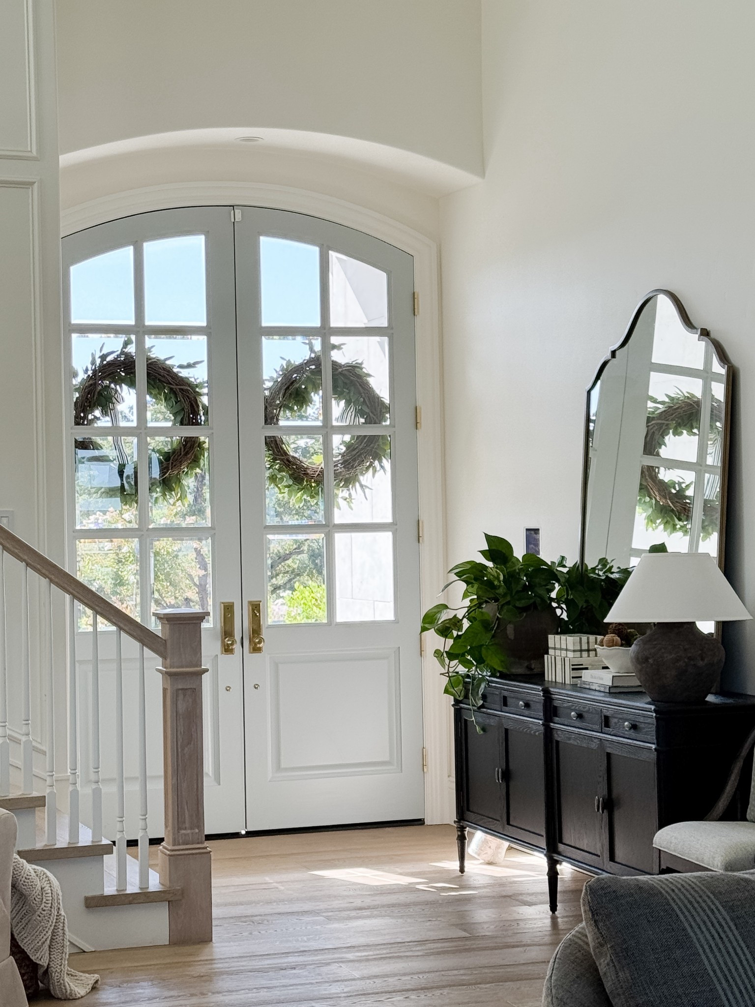 Still loving this beautiful sideboard I got last winter!  It comes in a beautiful wood color too!  So excited about my new swivel chairs for the family room!  This arched mirror is such a great price point!  It is huge!  And that table lamp is still my favorite!  I have four!