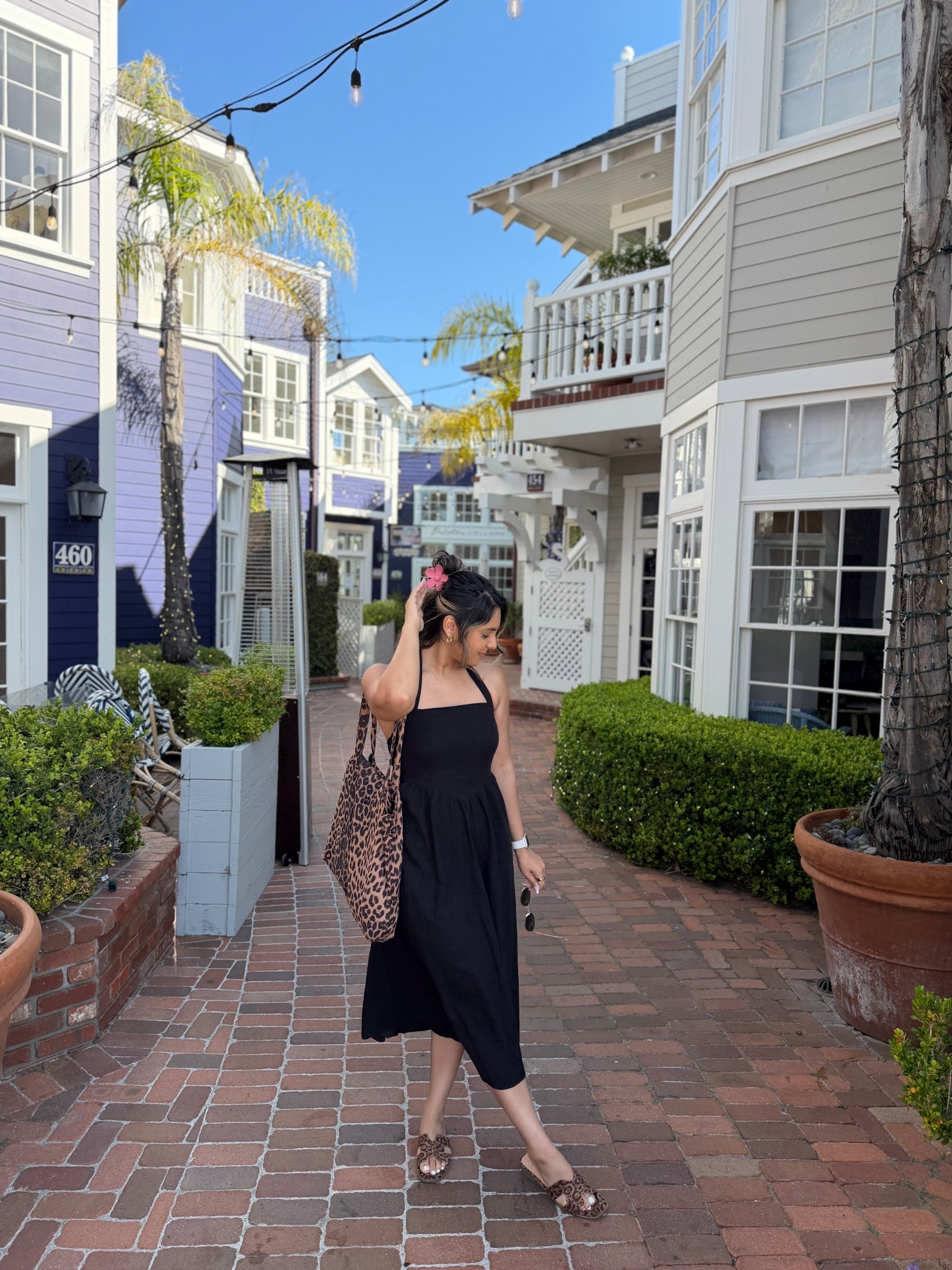 This black midi dress is one of those throw-on-and-go staples that always looks put together. Dressed it up with leopard flats + a matching tote for a little print moment 🐆 and added a claw clip for that effortless vibe. 

#LTKSeasonal #LTKootd