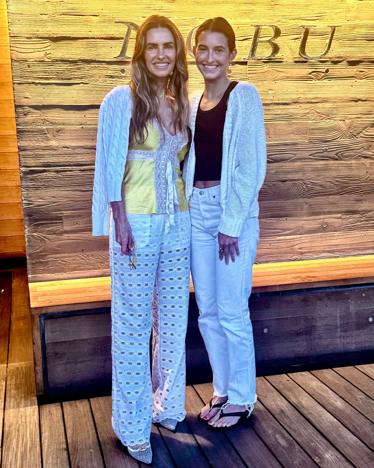 arden & i off to dinner at a college favorite of mine nobu malibu it was incredible & had the best vibe🤍

wearing a stunning silk & lace tank (in small), white eyelet pants in small, my fav cardi & kitten heels too! 

arden wearing tank, levi’s & chic wedges (that u won’t believe the price)

#LTKTravel #LTKdayinmylife #LTKootd