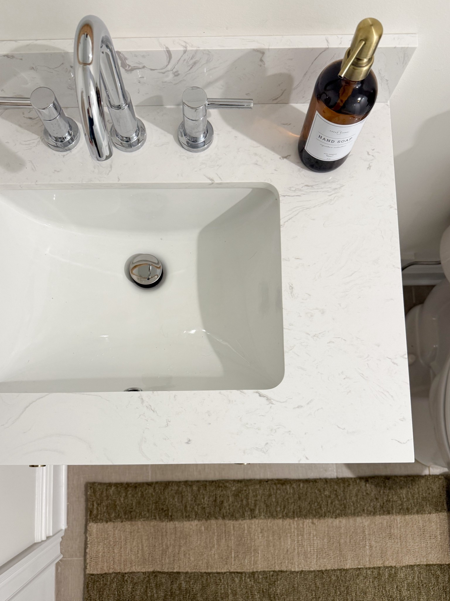 We renovated our bathroom over the summer and when it came time for the finishing touches, I found everything that I needed at @loweshomeimprovement #ad! This gorgeous vanity fits like a glove and I LOVE the fluted detail on the front and the brass hardware. I also chose this beautiful faucet in polished nickel (I love to mix metals), towel ring and coordinating bathroom accessories, and the prettiest soap dispenser. 

#lowespartner #loweshomeimprovement #diy #bathroomdesign #holidayhome

#LTKGiftGuide #LTKHoliday #LTKHome